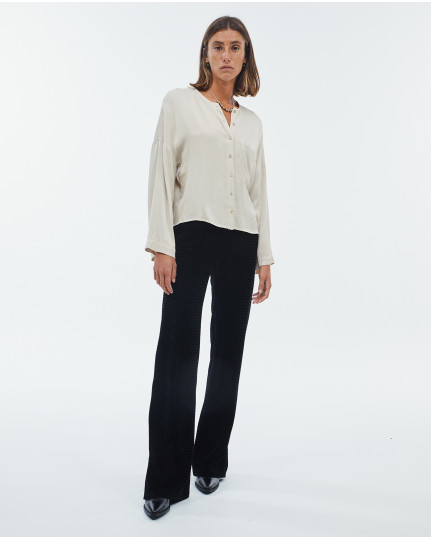 Black trousers with flared hem
