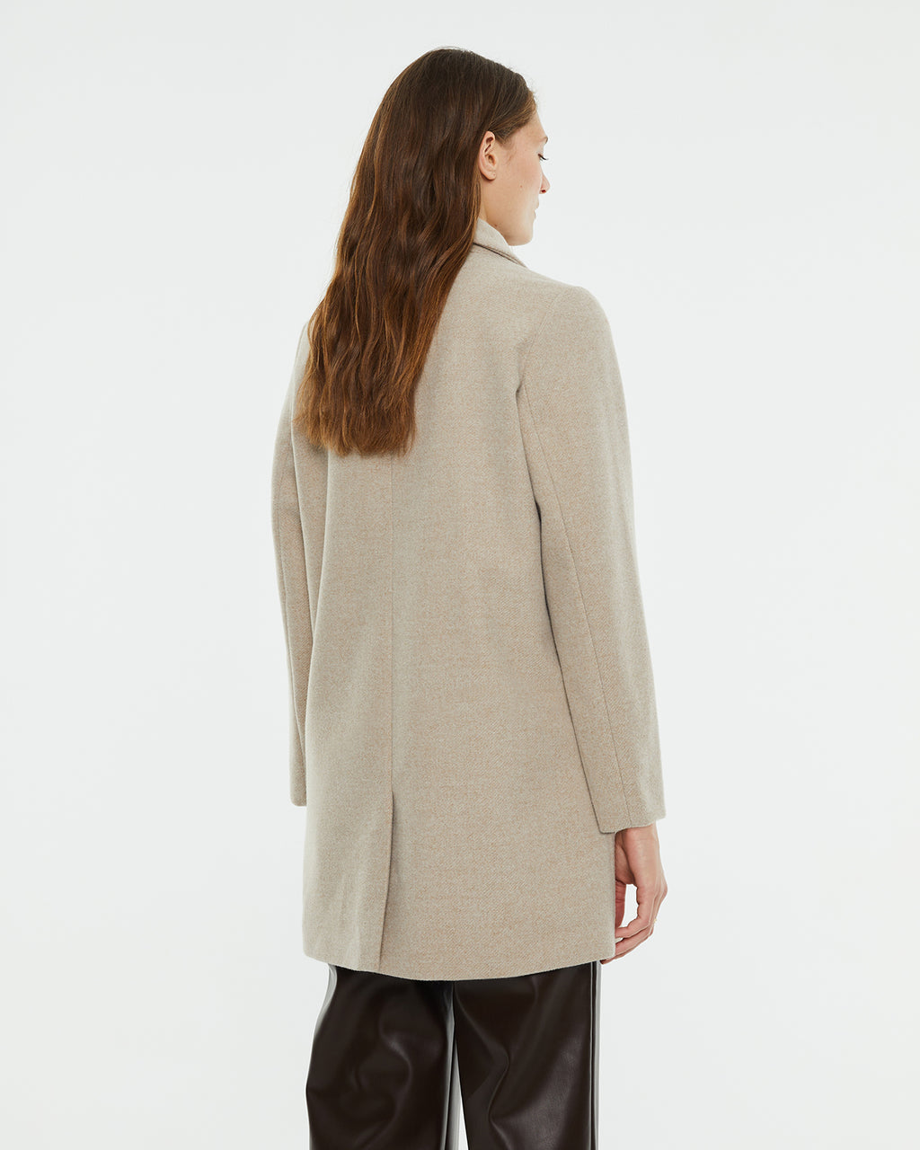 Classic camel cut coat with opening at the back