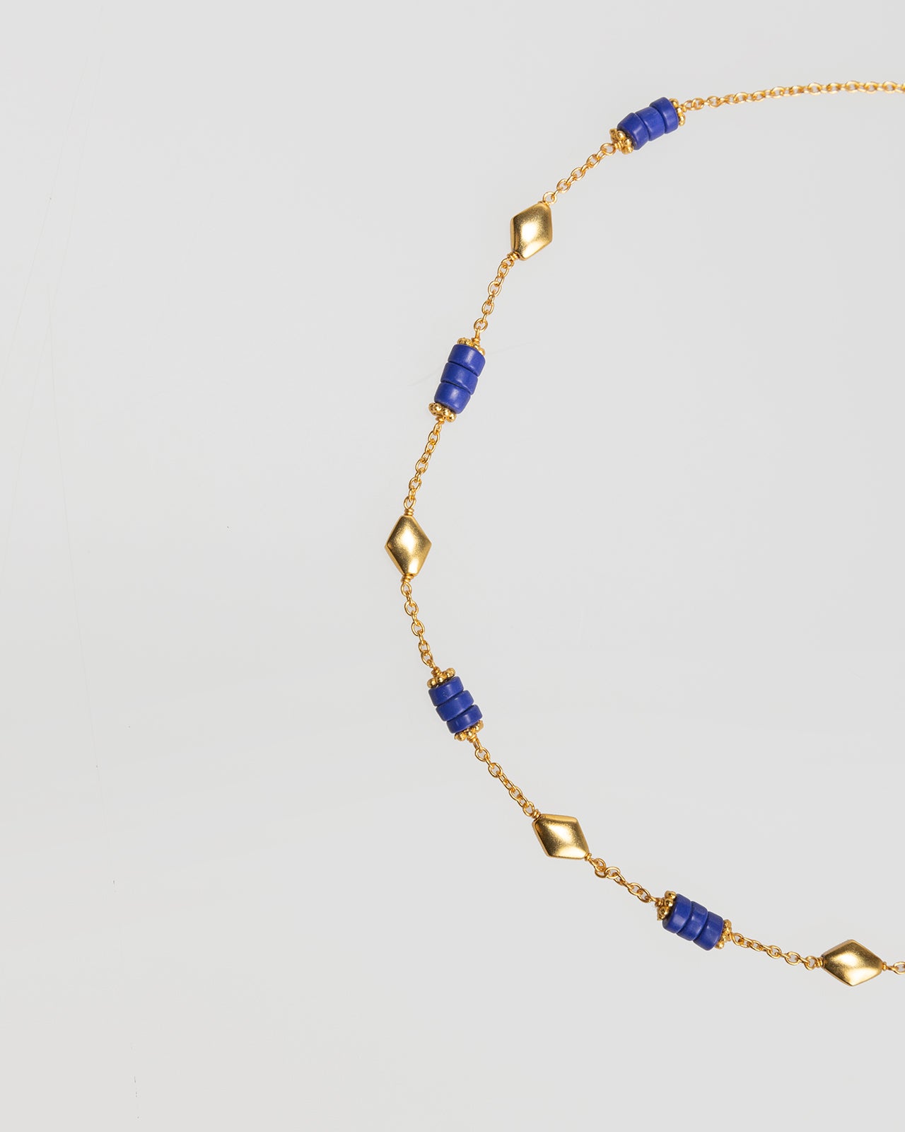 Gold and blue bead necklace