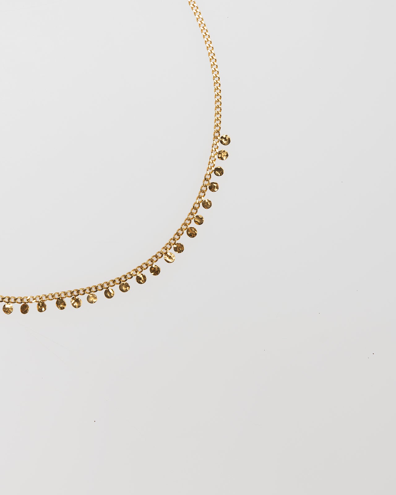 Gold-colored beaded necklace