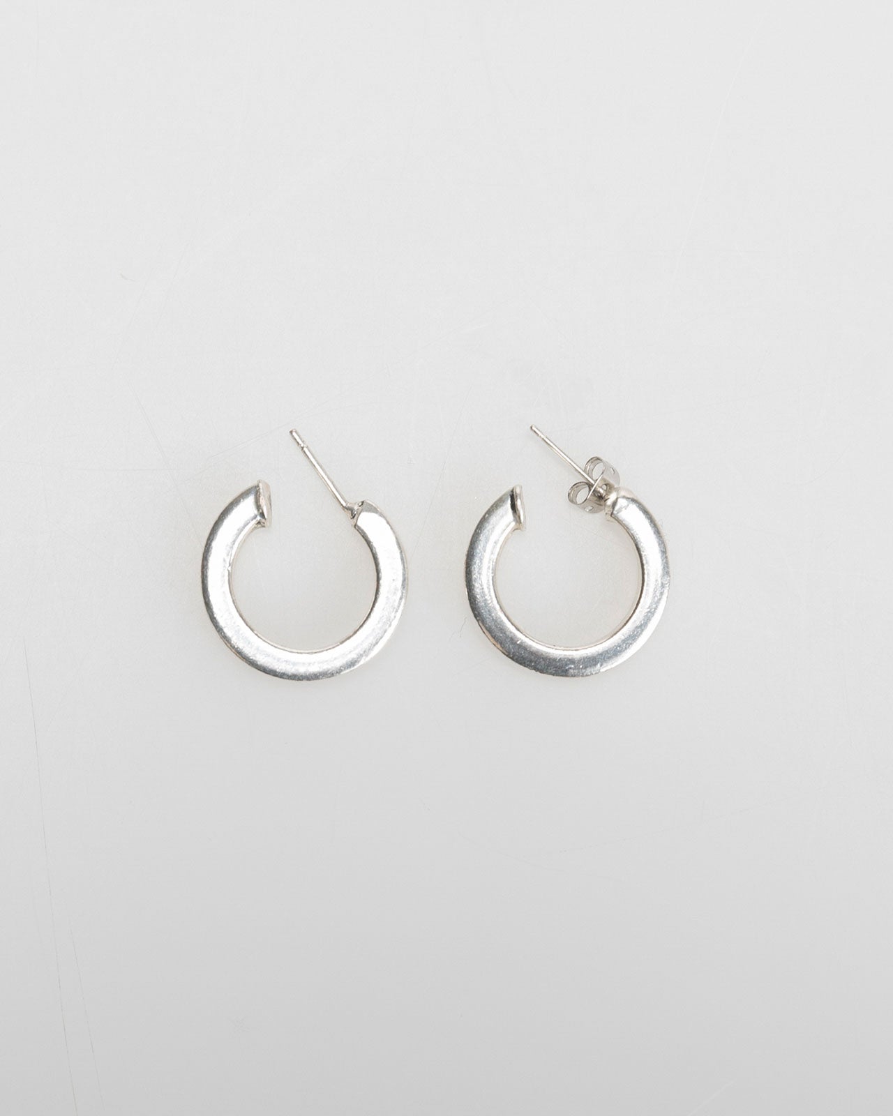 Plain silver-colored hoop earrings