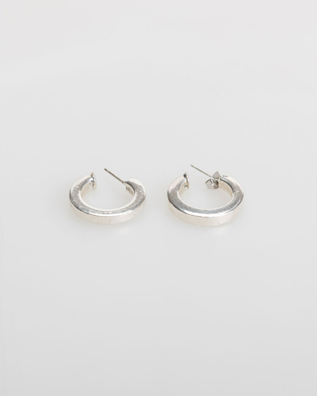 Plain silver-colored hoop earrings