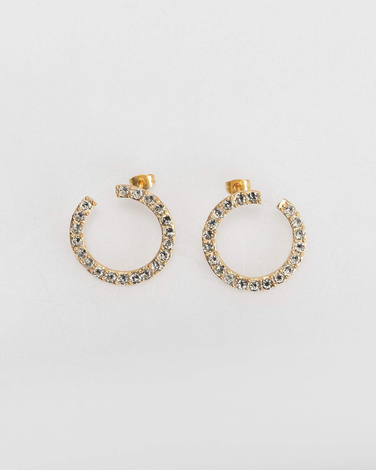 Gold hoop earrings with rhinestones