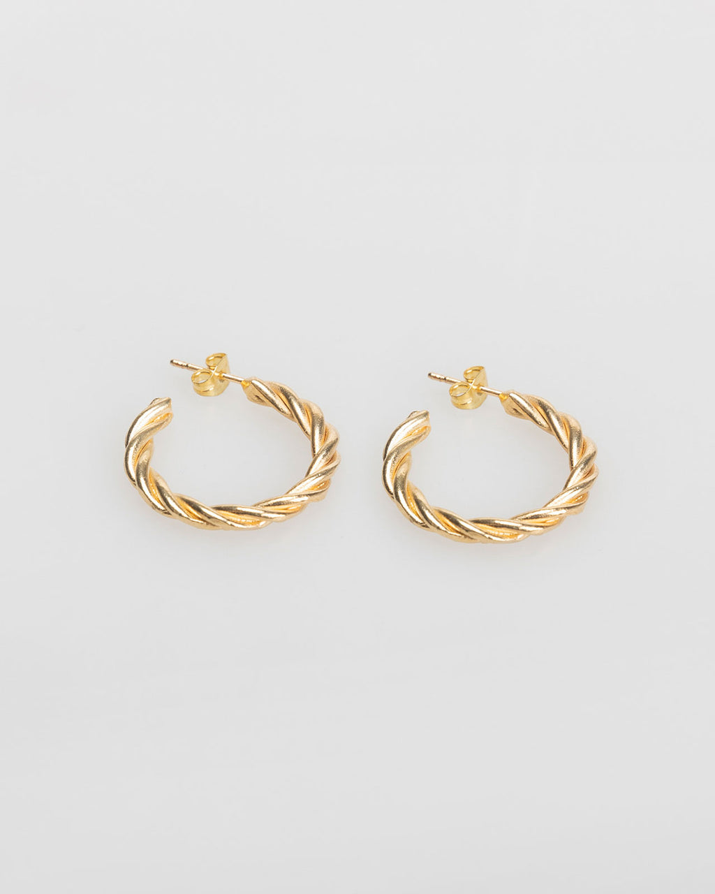 Gold relief hoop earrings with nut closure