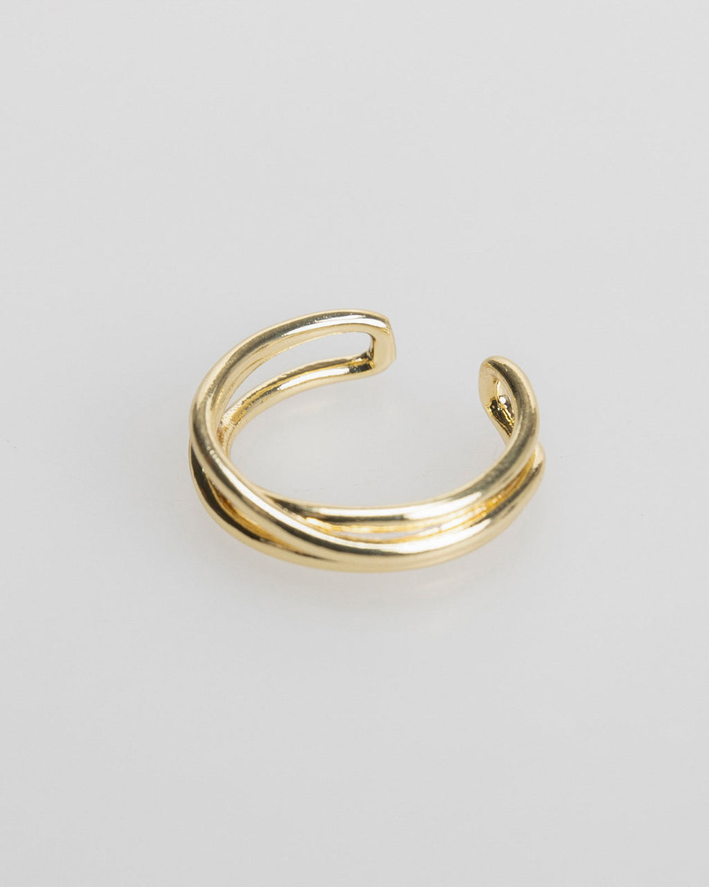 Pack of three gold-coloured rings with relief