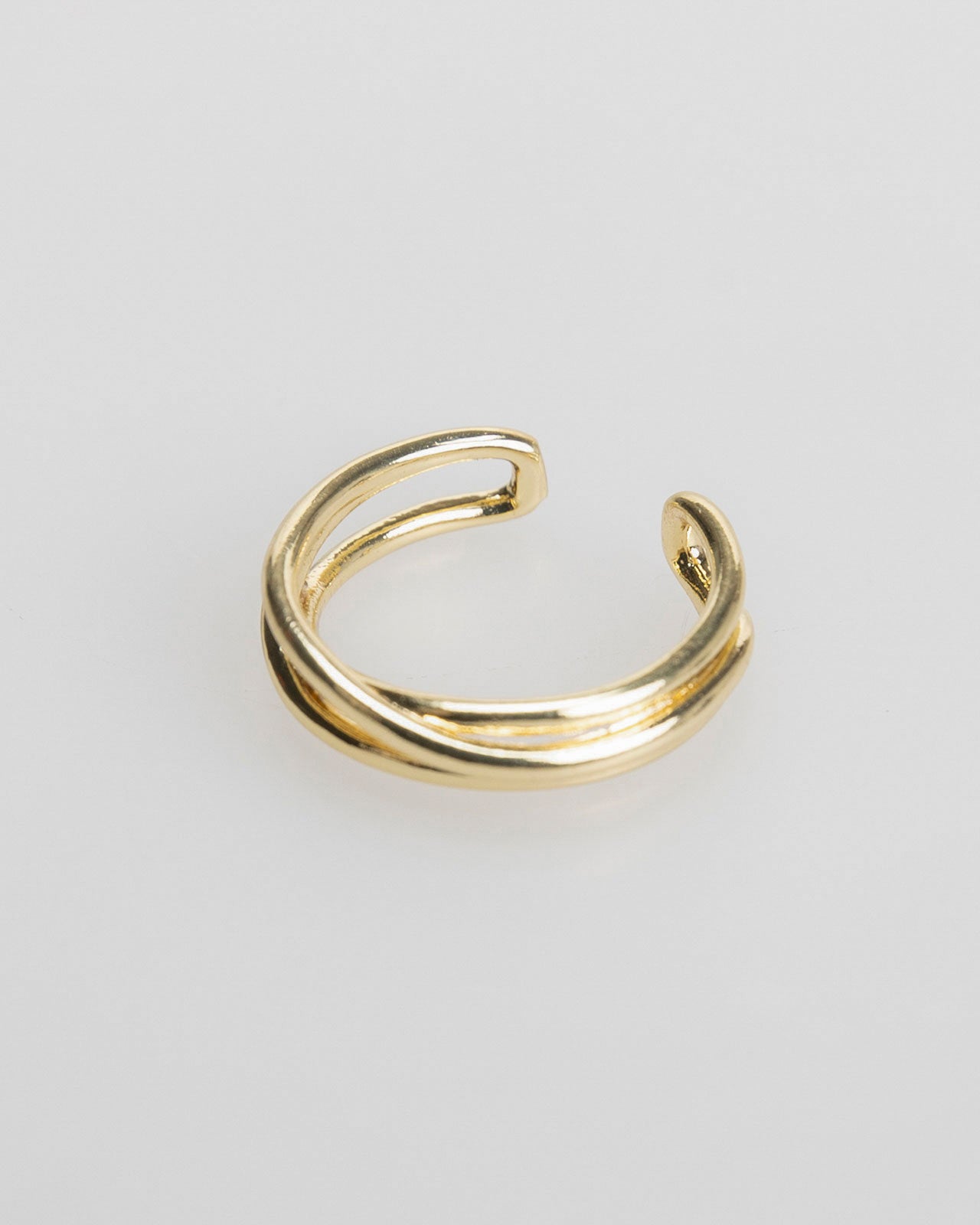 Pack of three gold-coloured rings with relief