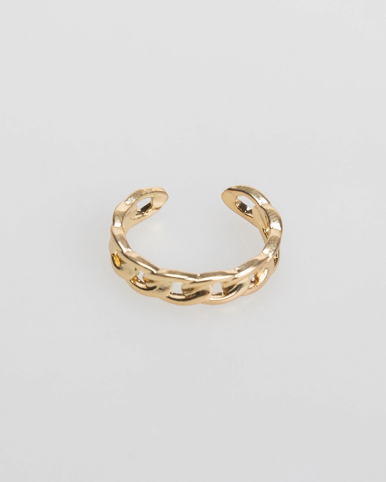 Pack of three gold-coloured rings with relief