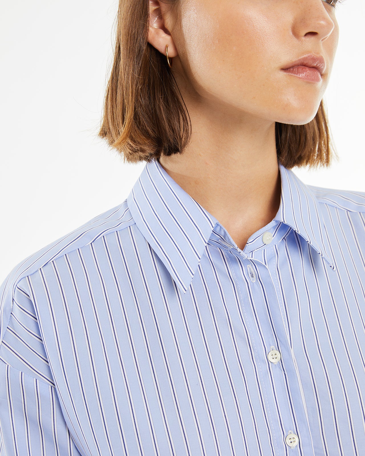 Blue striped shirt with front pocket