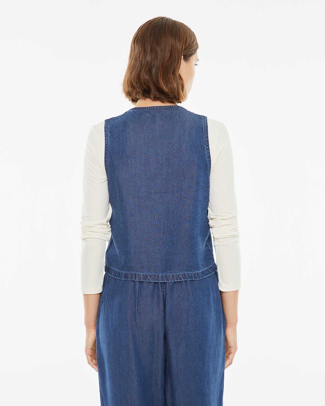 Denim effect vest with button closure