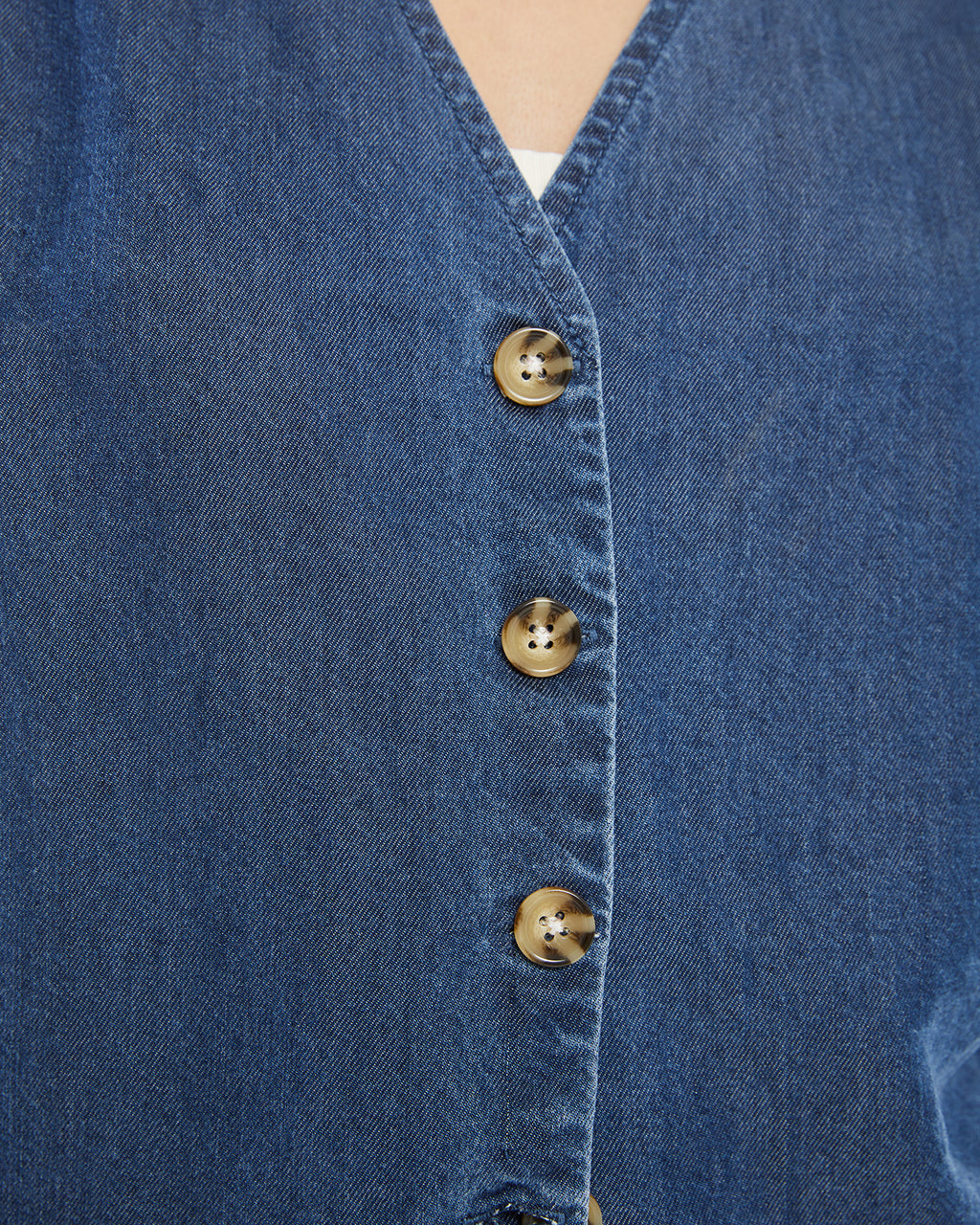 Denim effect vest with button closure