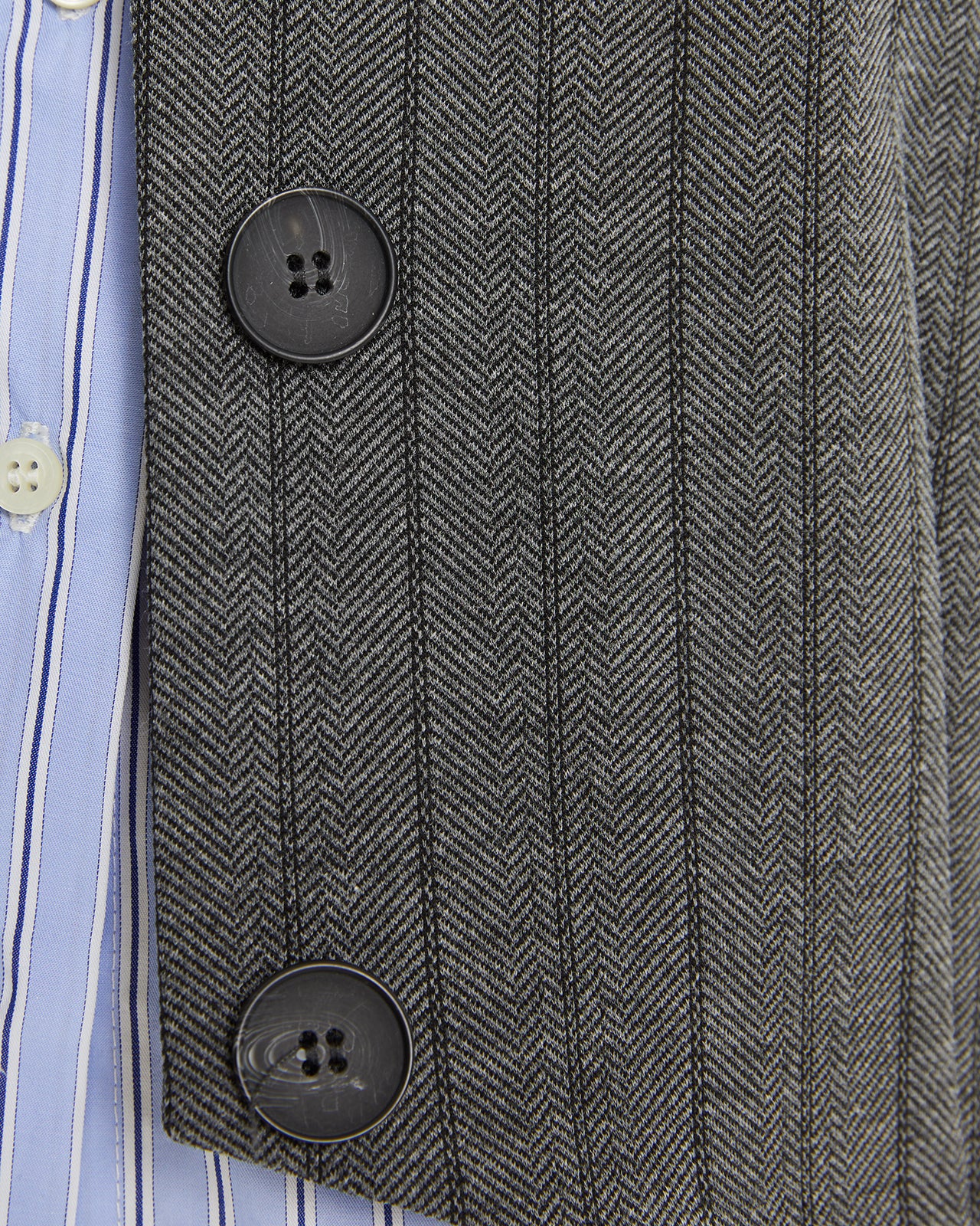 Pinstripe vest with hidden button closure on the front