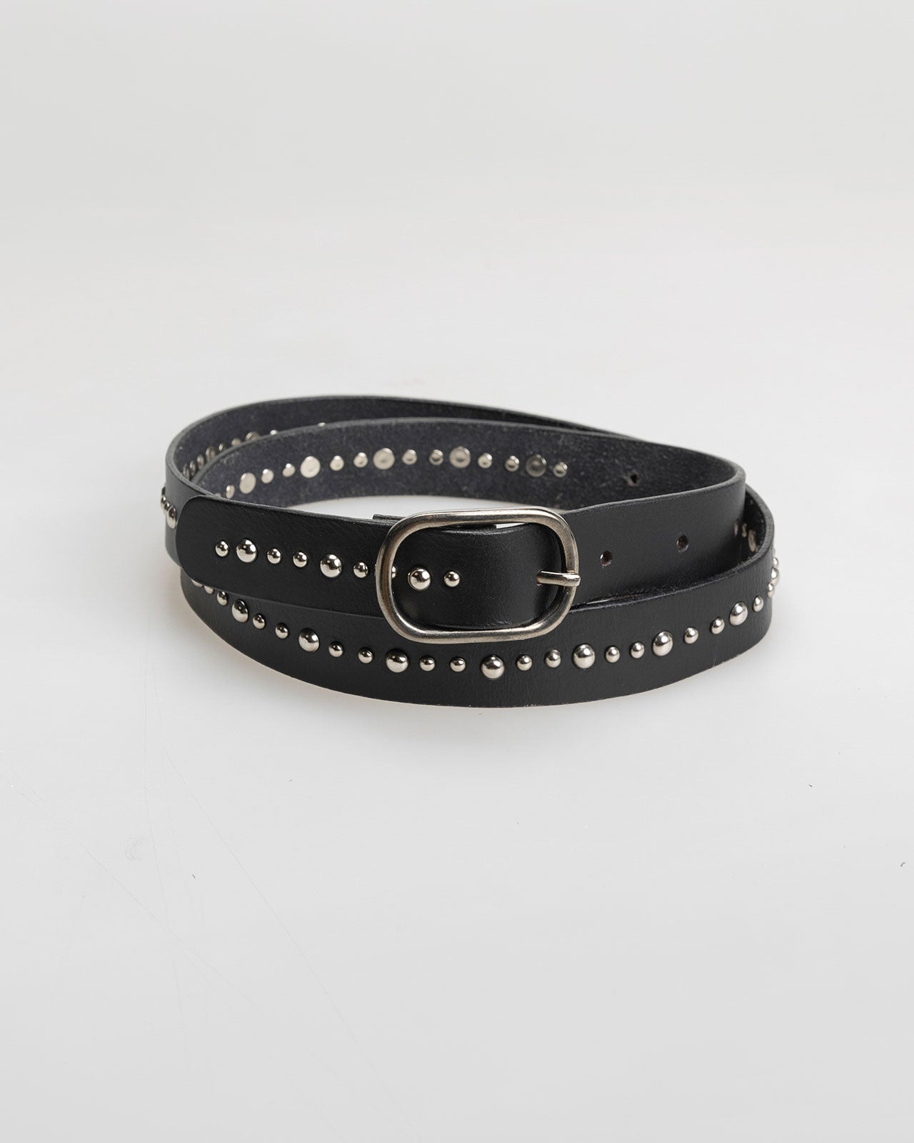 Leather belt with studs and metal buckle