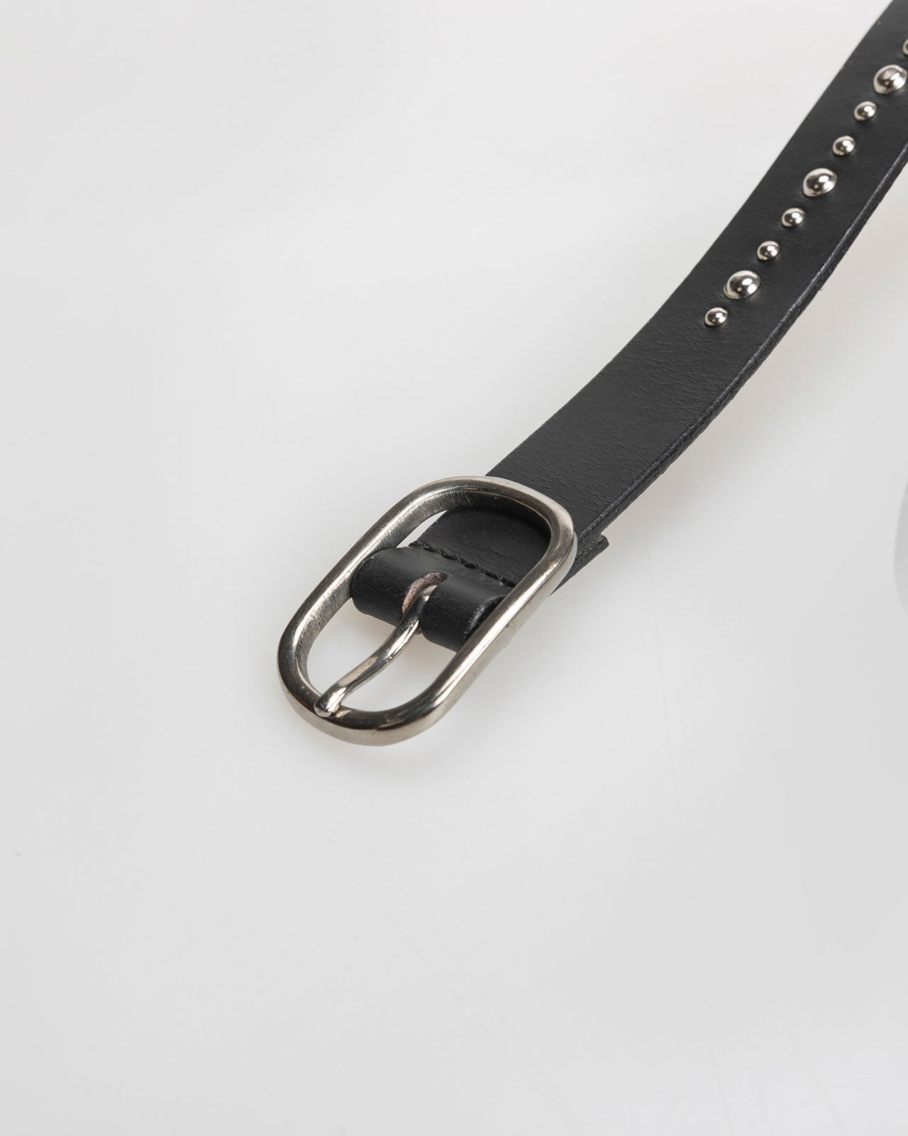 Leather belt with studs and metal buckle