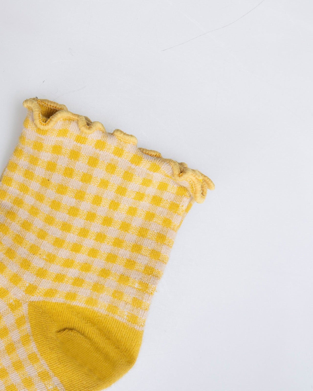 Checkered sock with ruffle finish