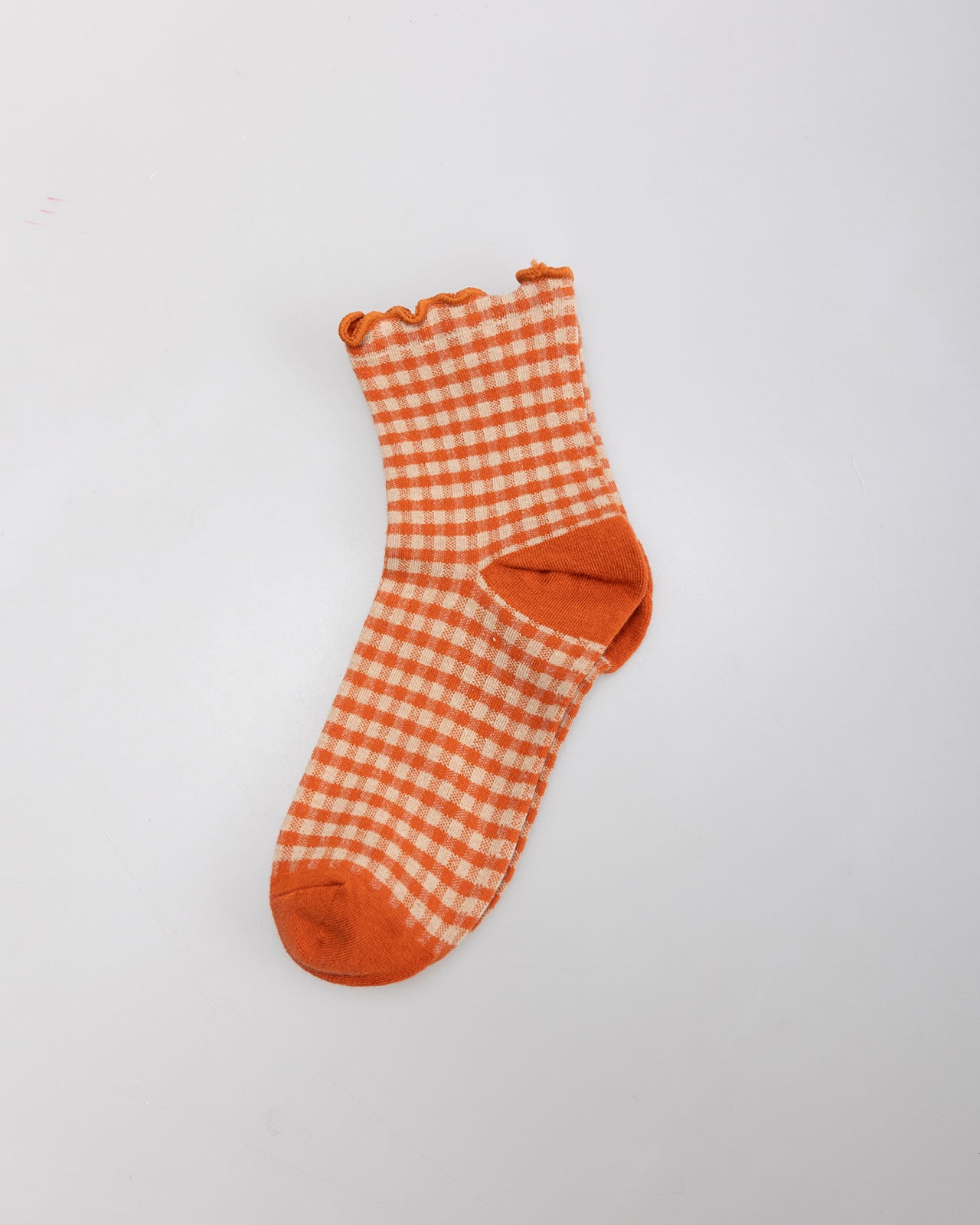 Checkered sock with ruffle finish