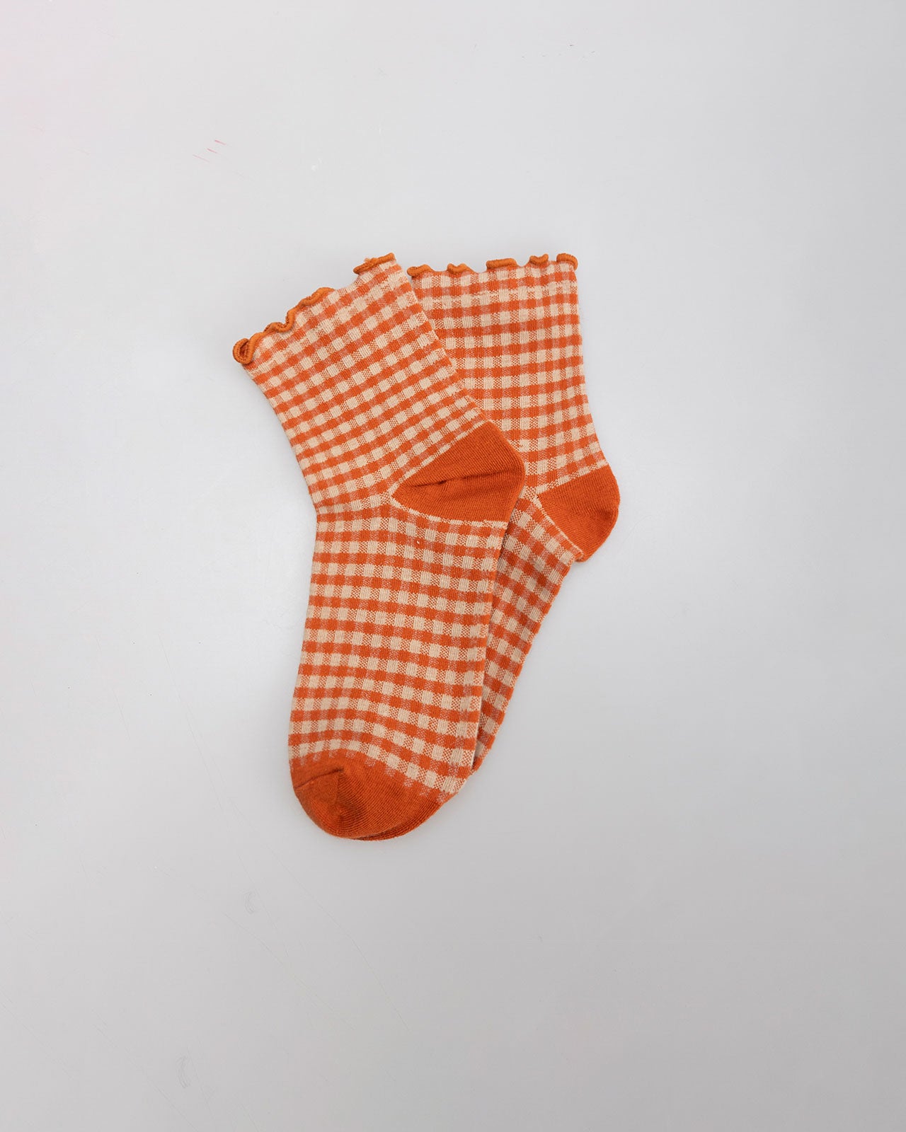 Checkered sock with ruffle finish