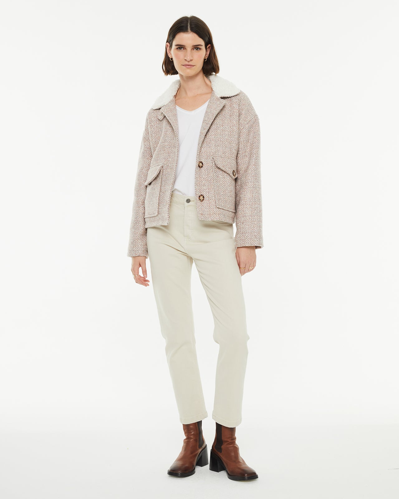 Short jacket with button closure and sheepskin lining