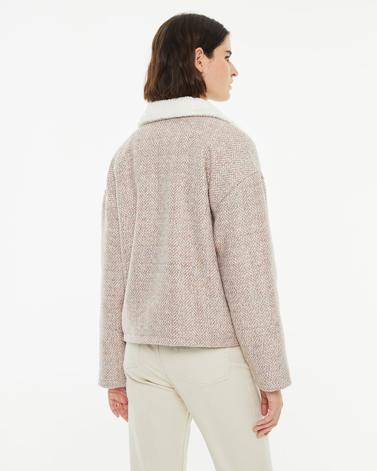 Short jacket with button closure and sheepskin lining