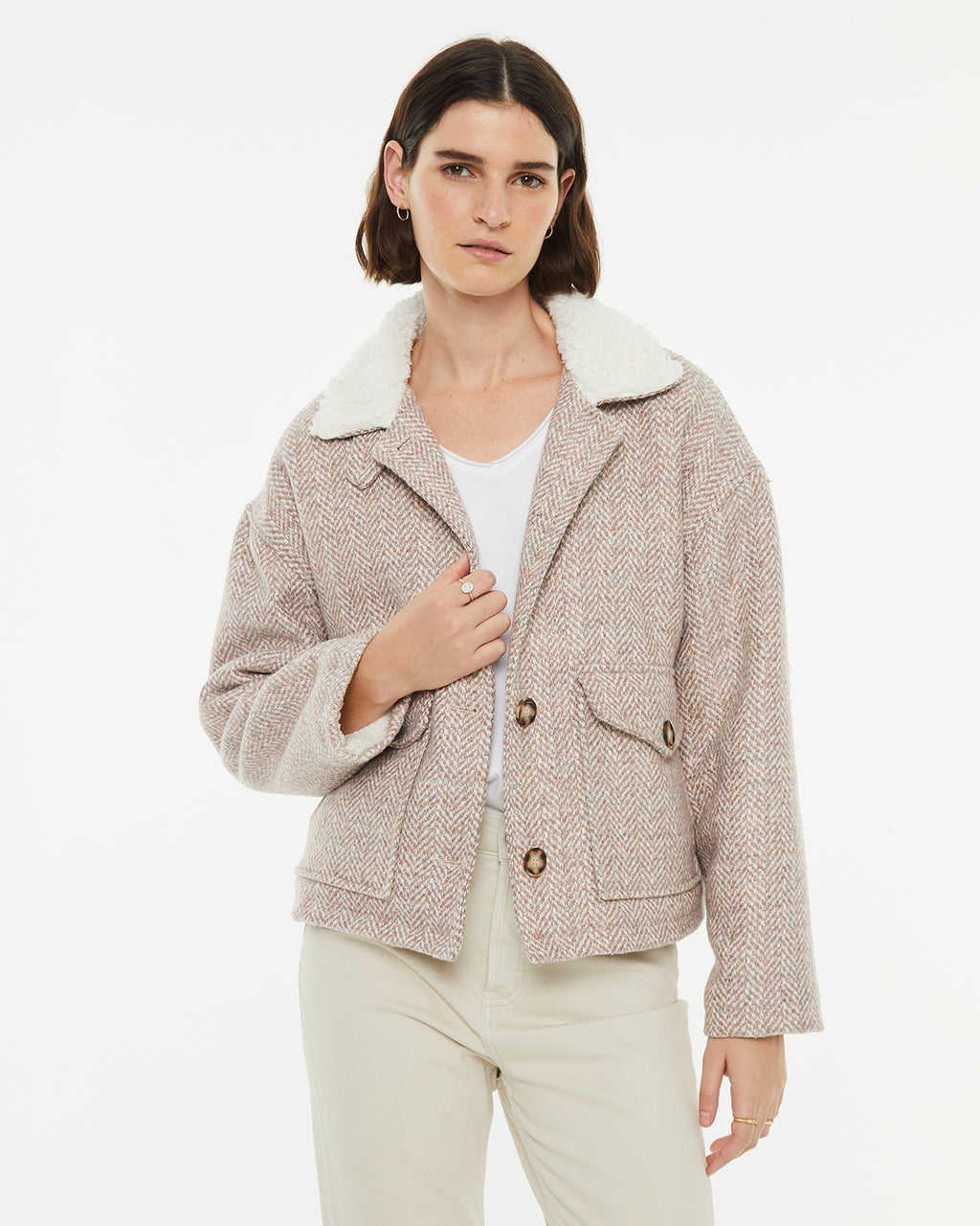 Short jacket with button closure and sheepskin lining