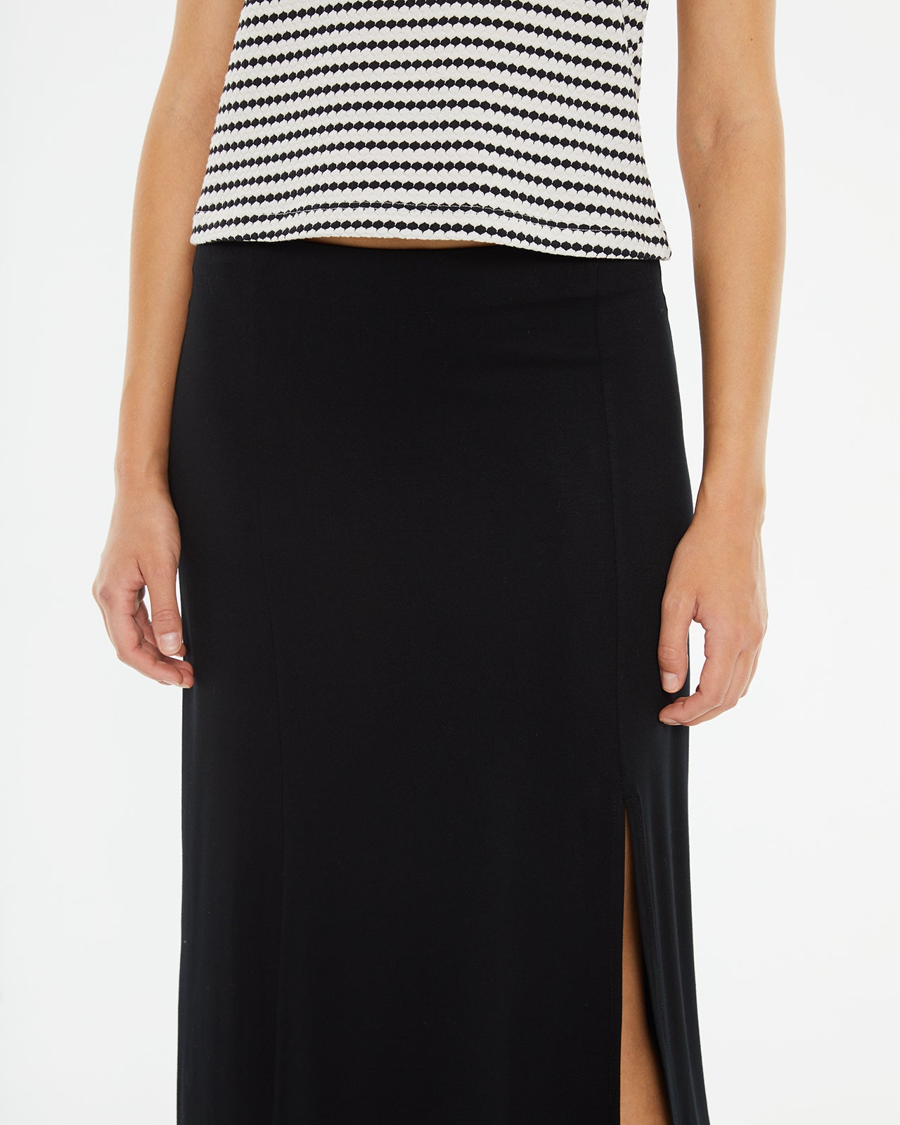 Midi skirt with slit and flared hem