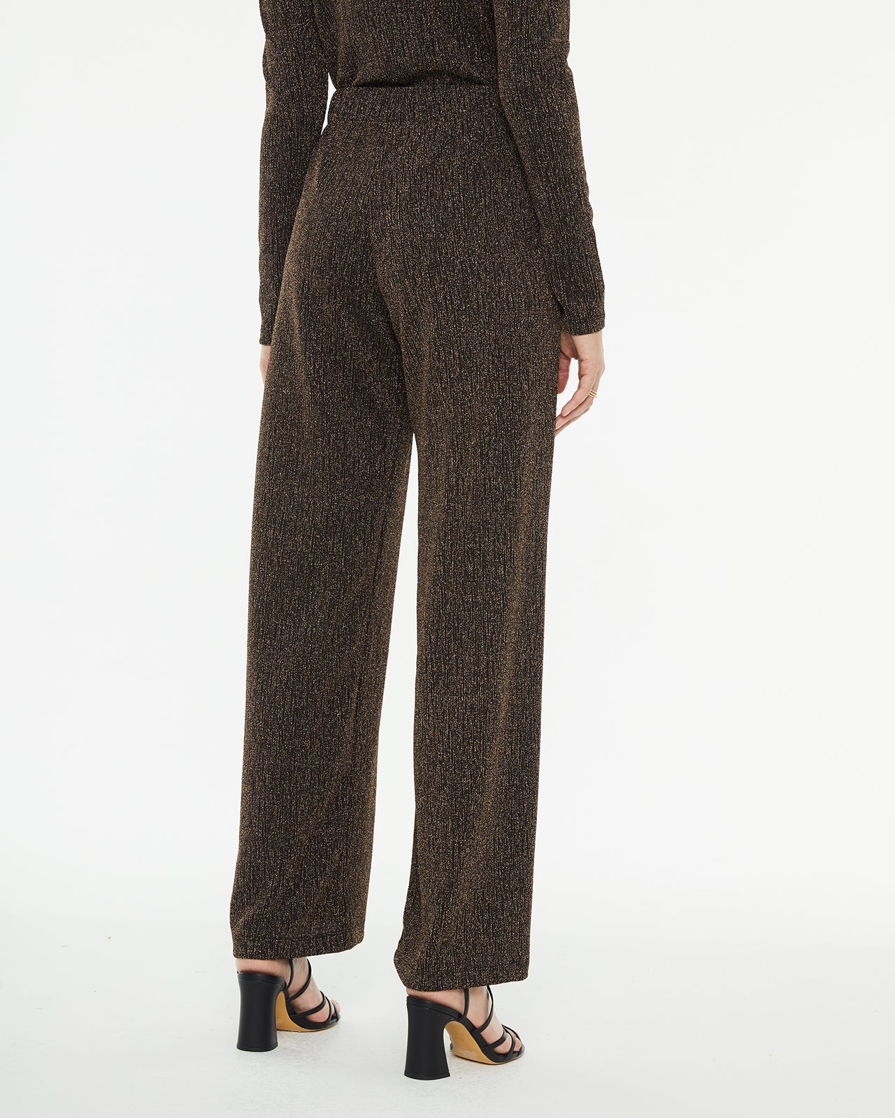 Long flared trousers with shine