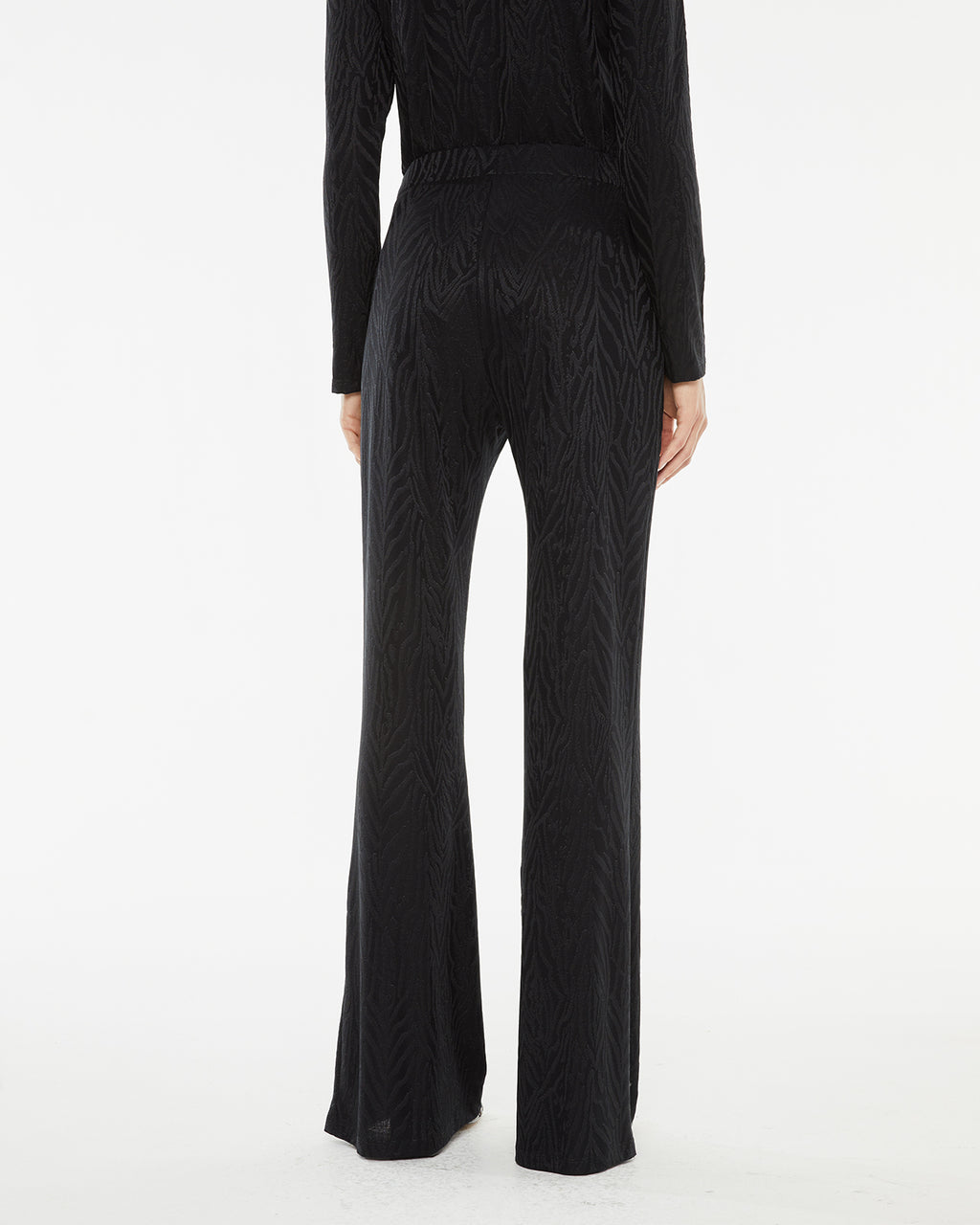 Long fitted and flared jacquard trousers