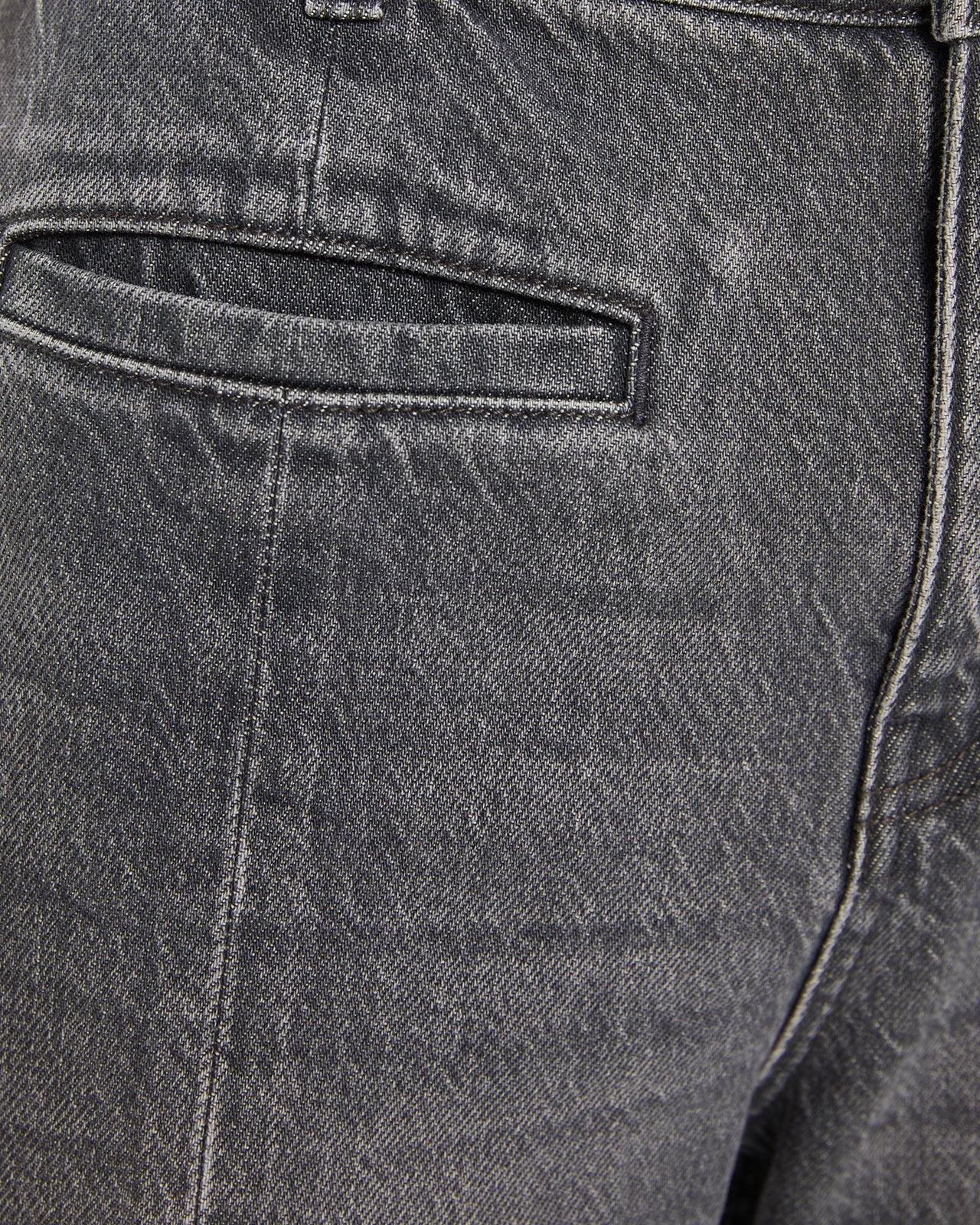 Pantalón denim flare gris detalle costura centro pierna