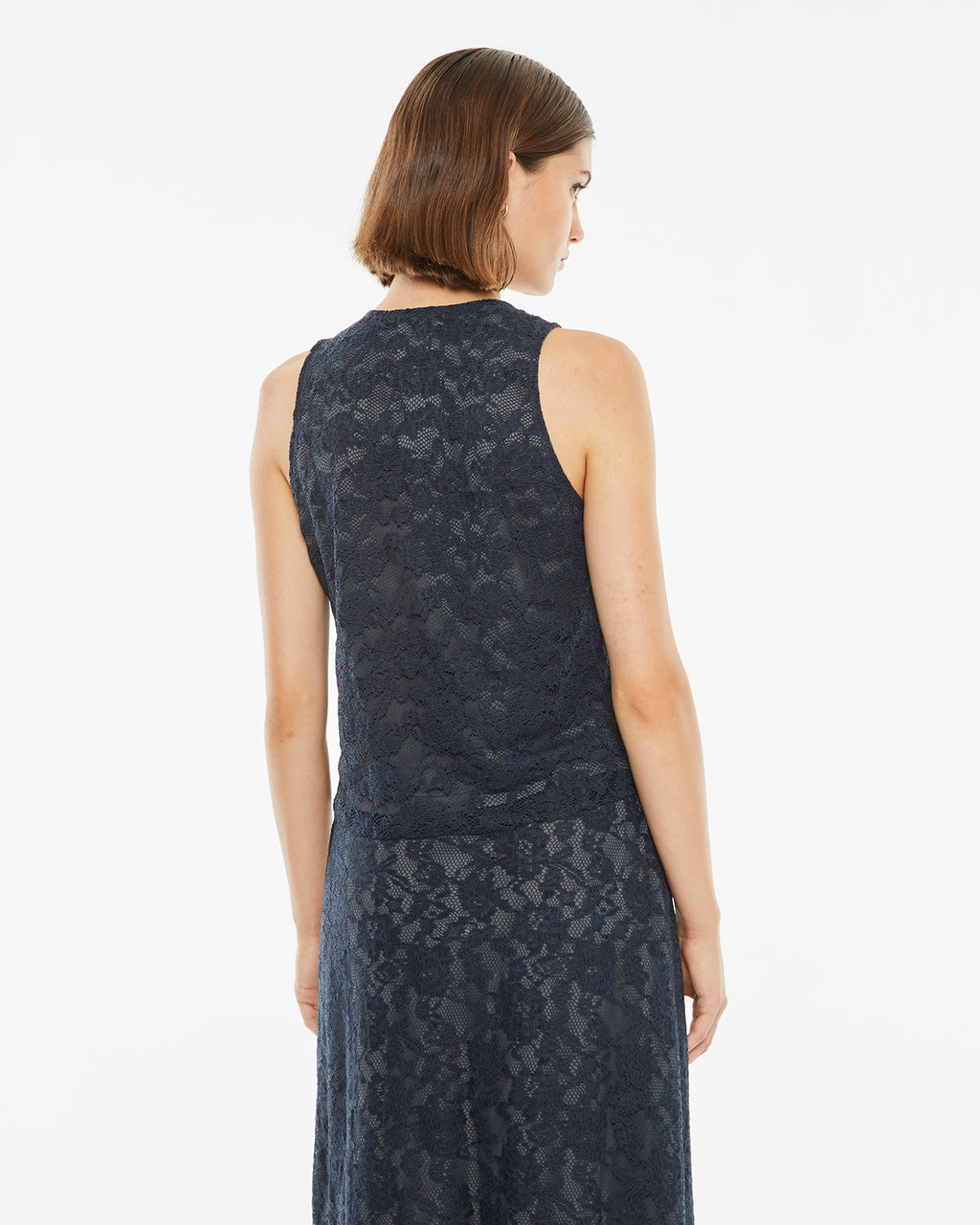 Sleeveless top in lace fabric