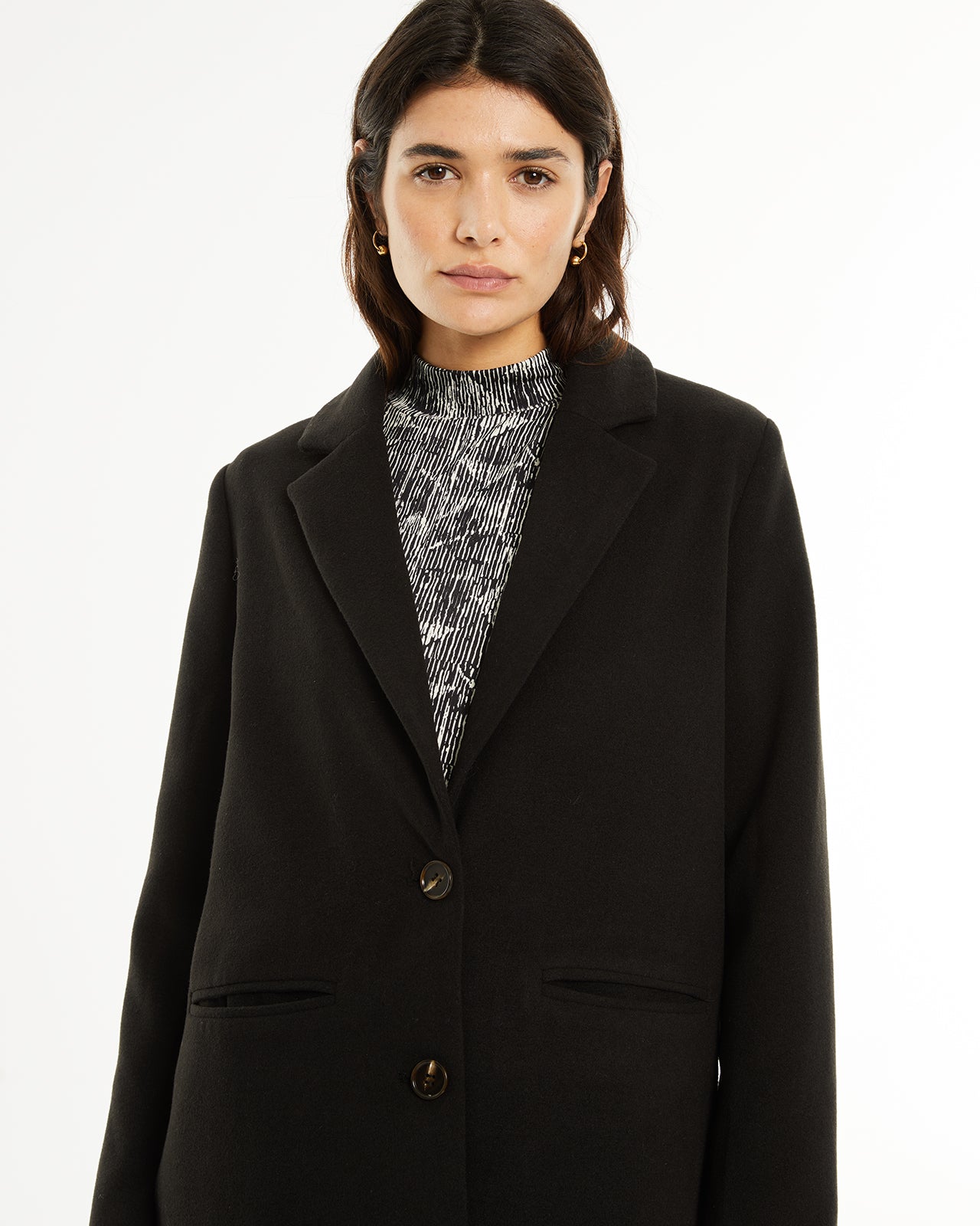 Manteau long à poches