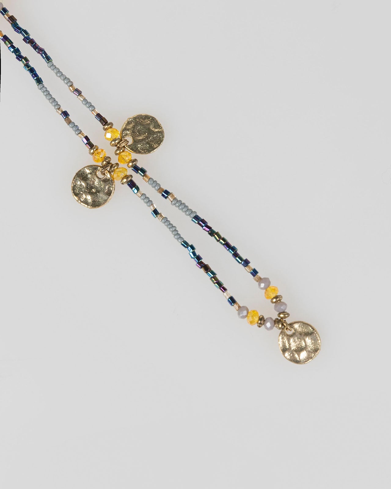 Long necklace with golden beads