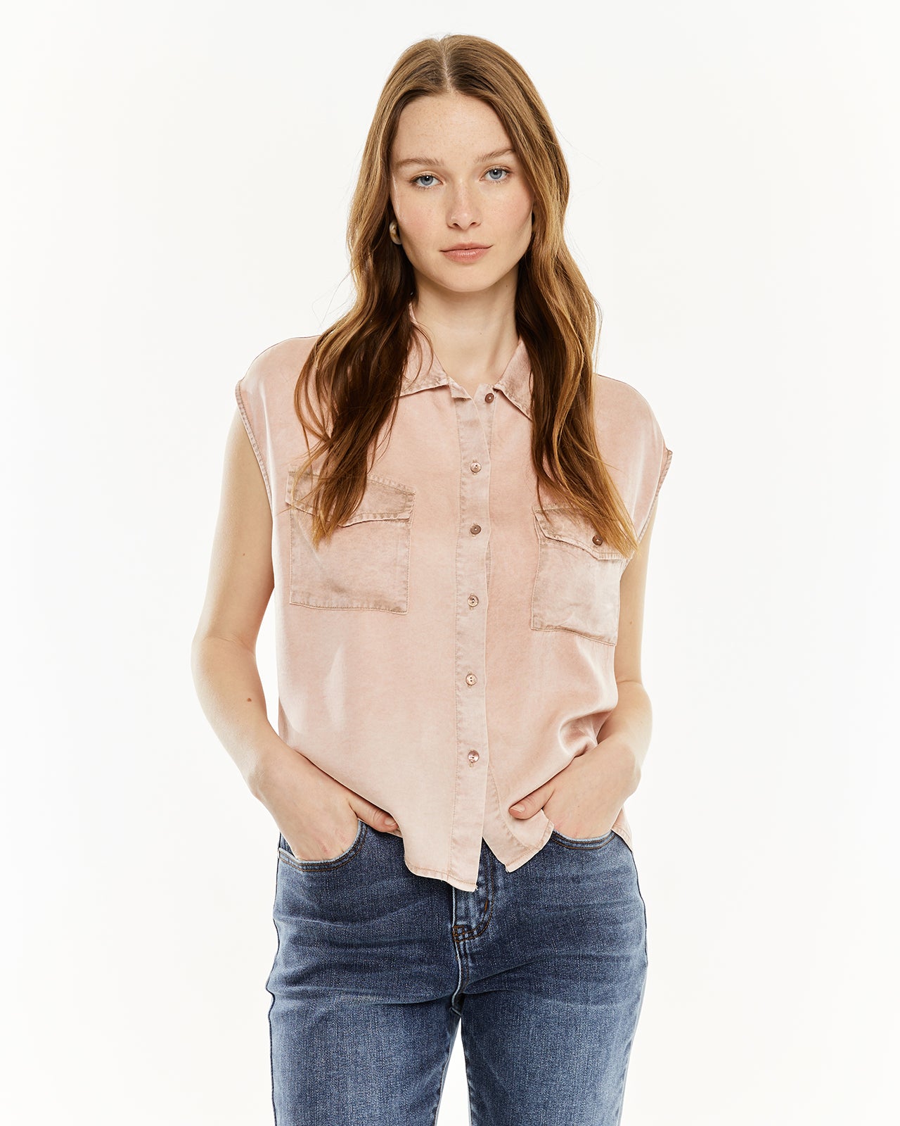 Shirt with worn-effect pockets