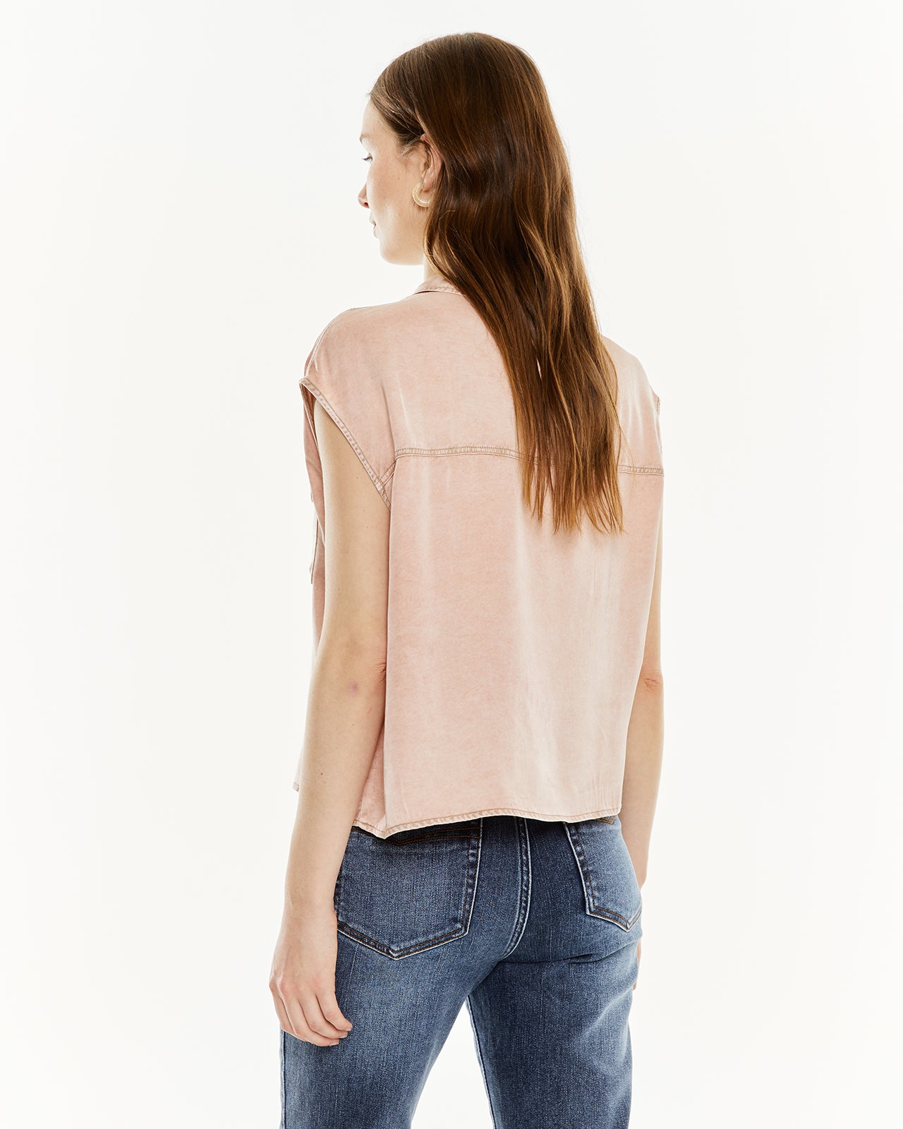 Shirt with worn-effect pockets