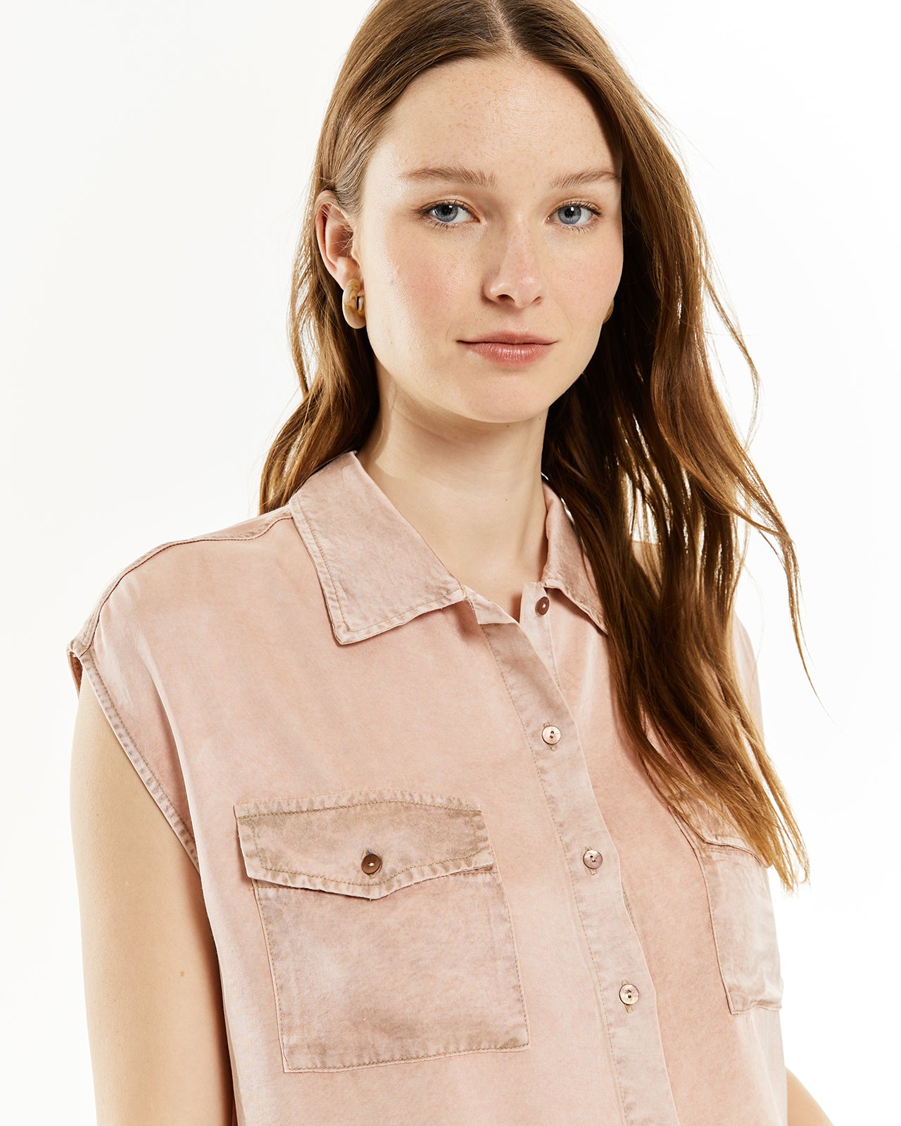 Shirt with worn-effect pockets