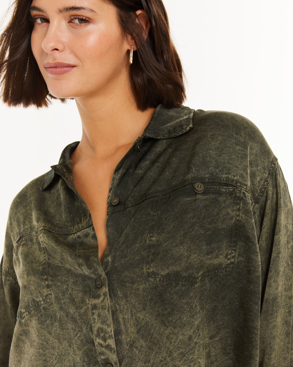 Camisa con bolsillos delanteros