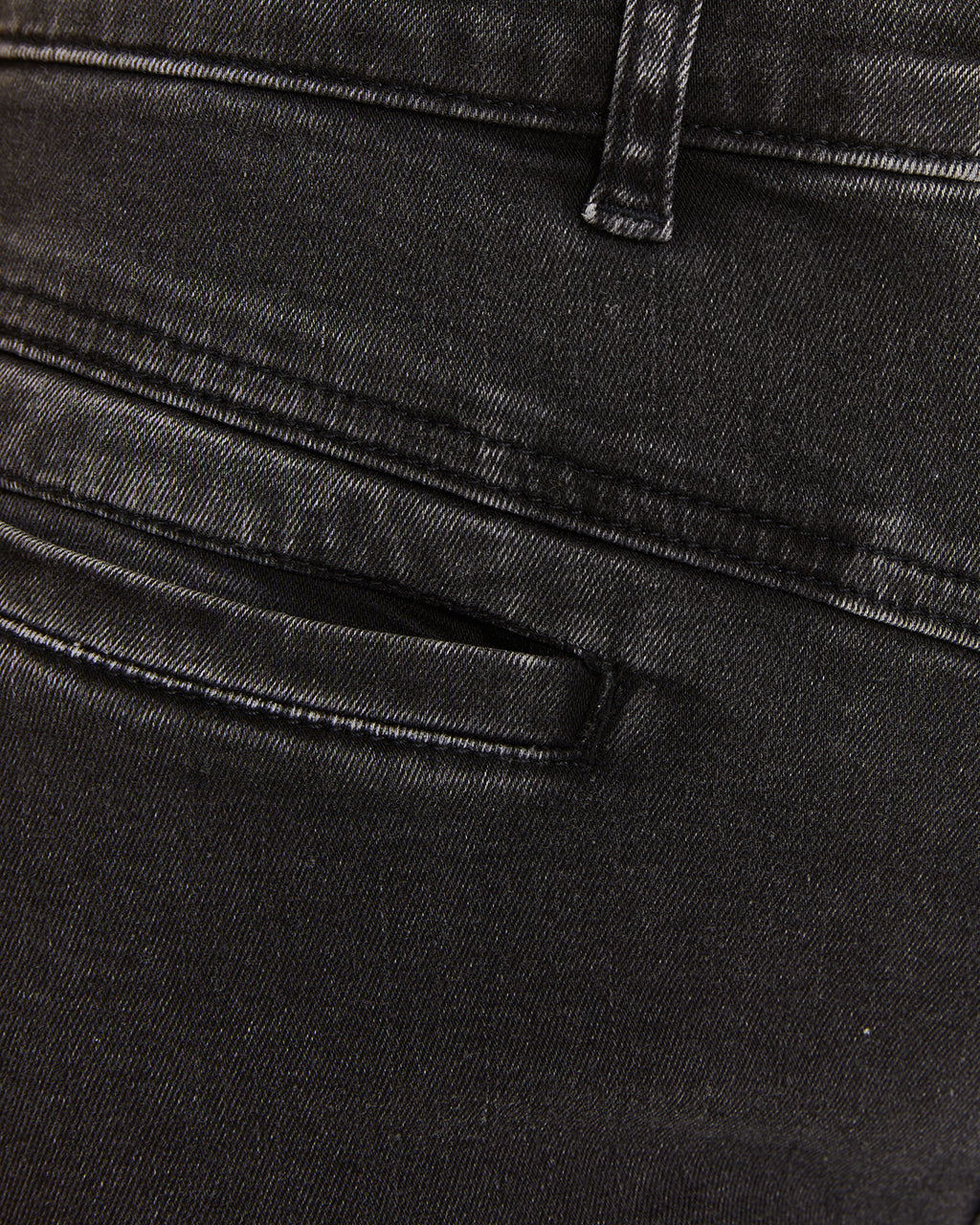 Pantalón denim bolsillos tipo vivo