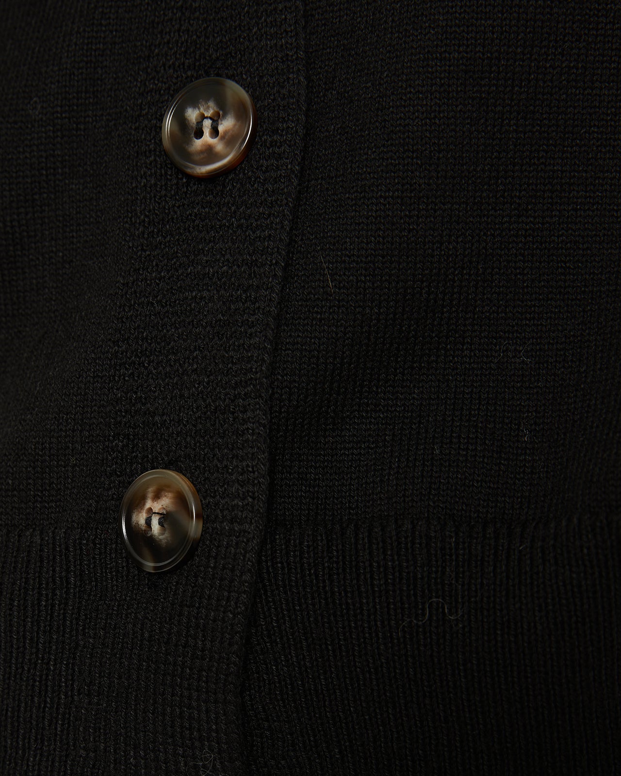 Cárdigan botones,detalle en tapeta