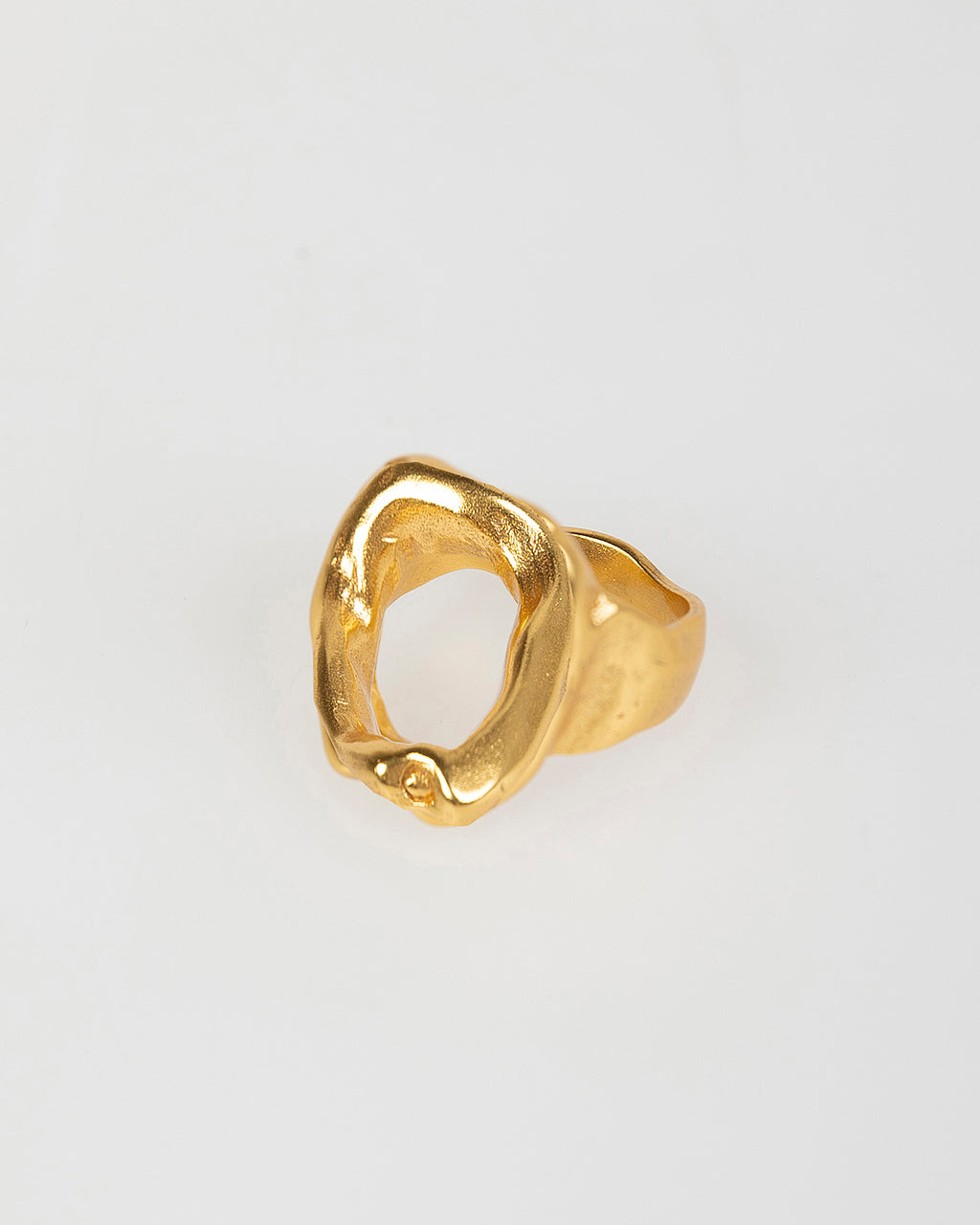 Open gold ring with seal