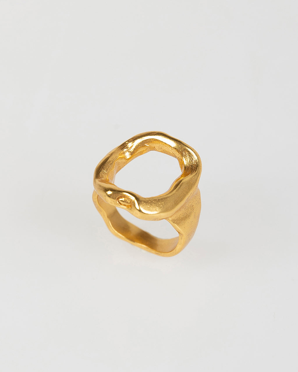 Open gold ring with seal