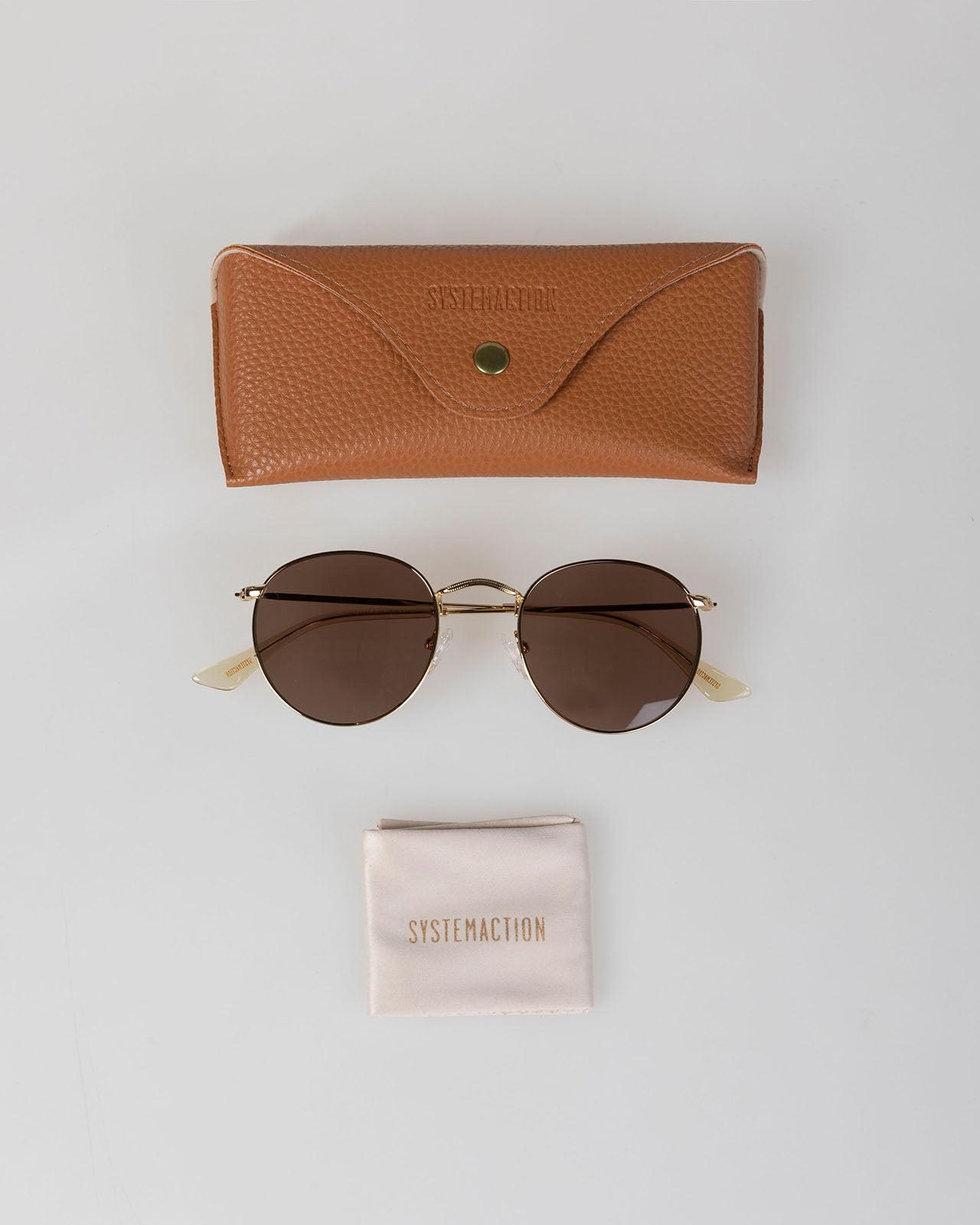 Lunettes de soleil à monture dorée