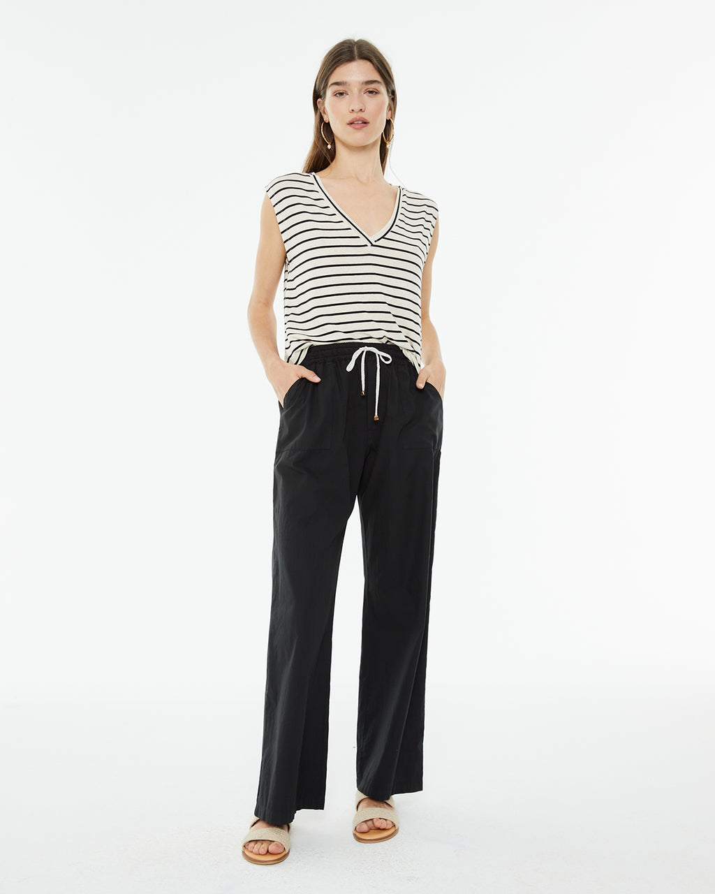 Straight trousers with patch pockets