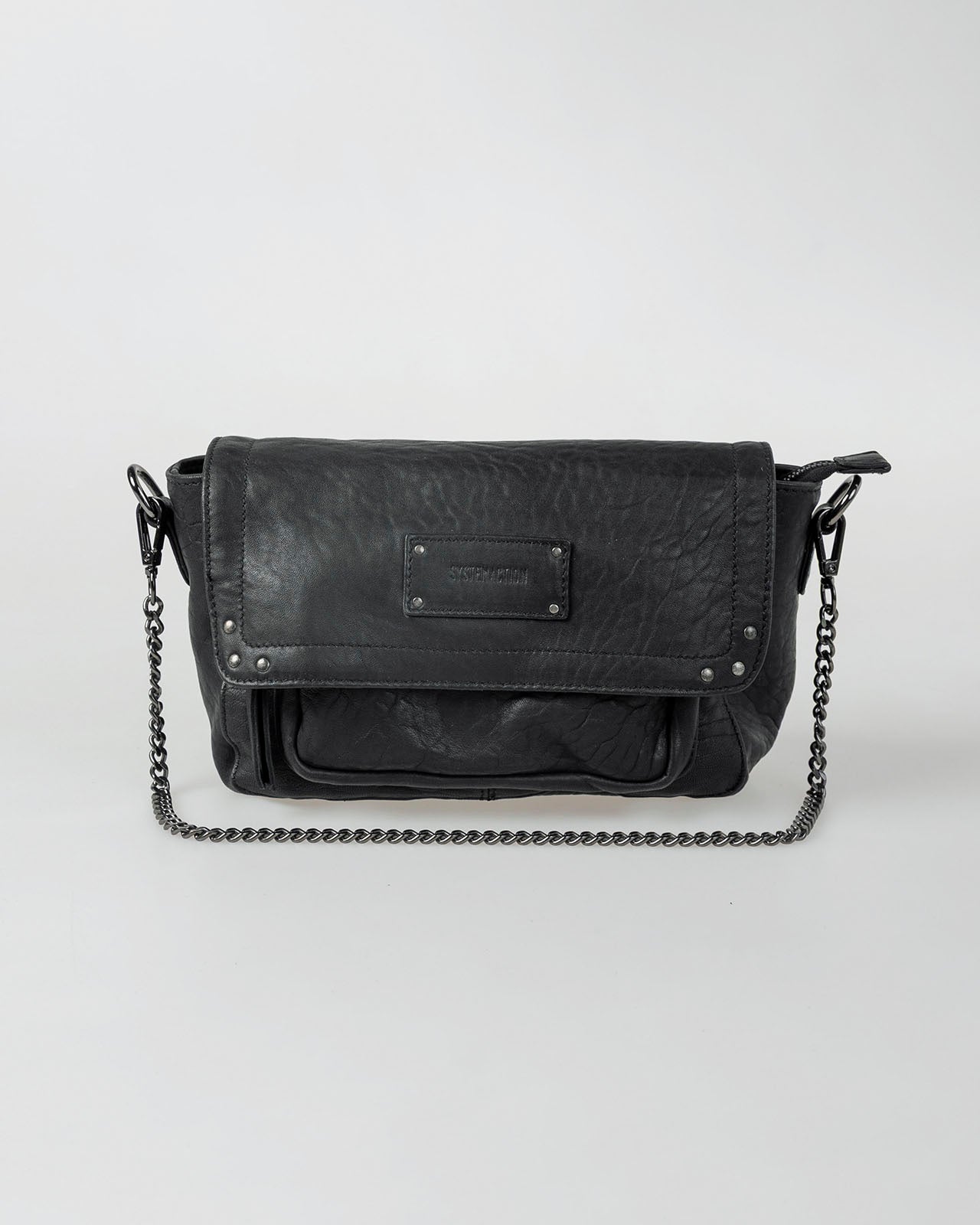 Bolso piel tachas