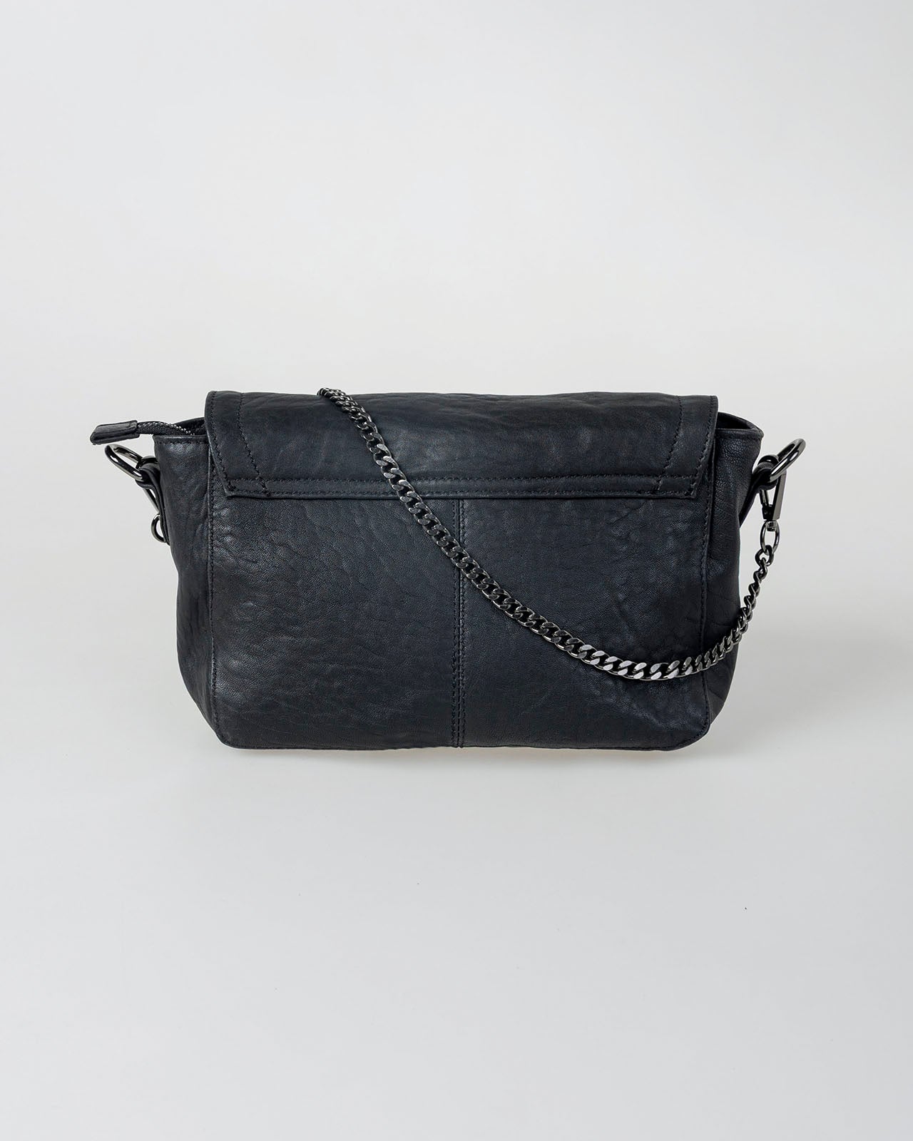Bolso piel tachas