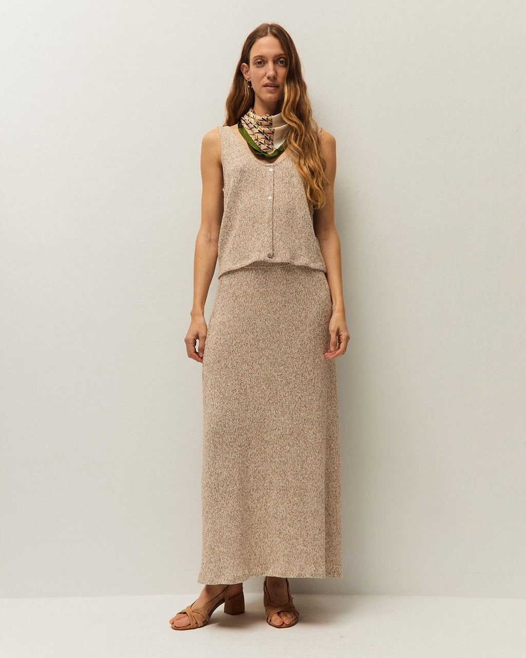 Sleeveless button-down top