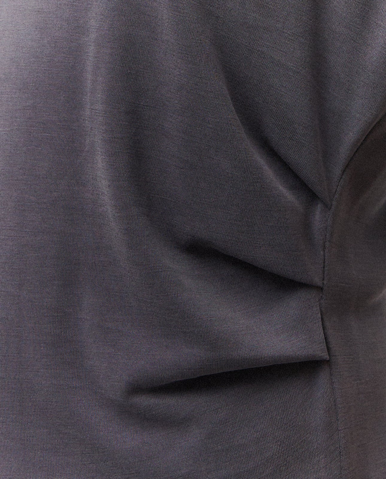 V-neck midi dress. Gathered detail at the waist