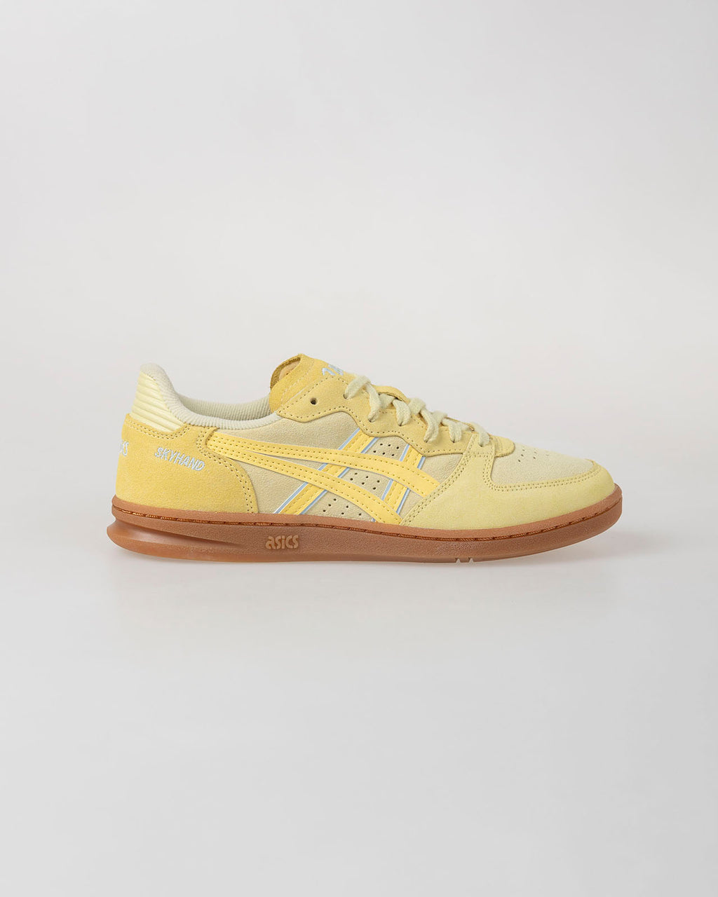 Yellow Asics Skyhand OG shoe