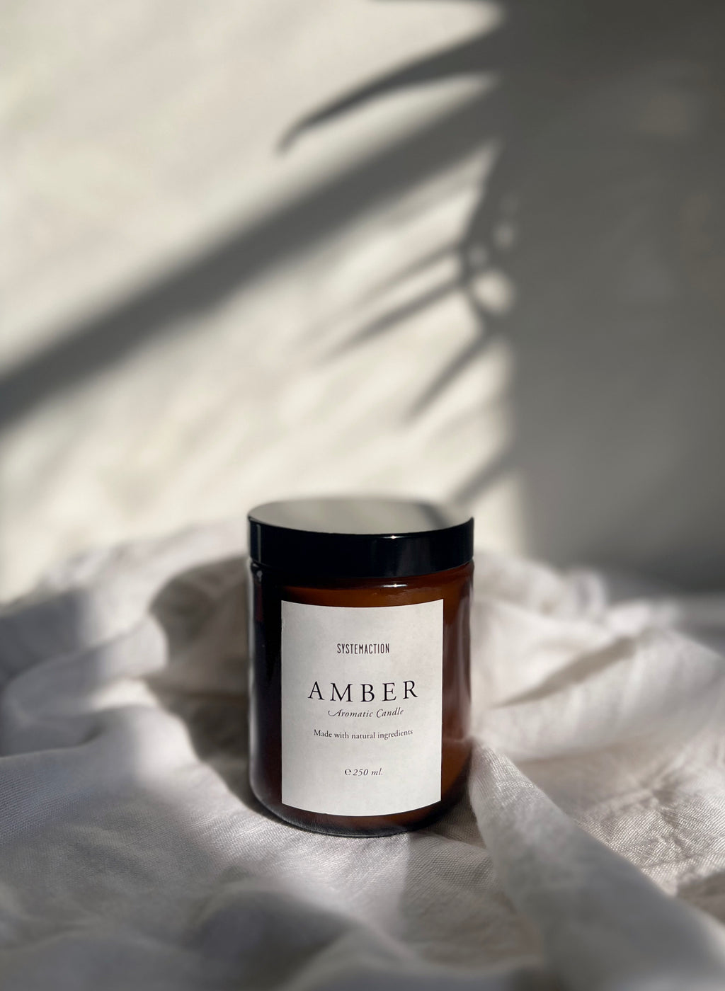 Amber System Action Scented Candle