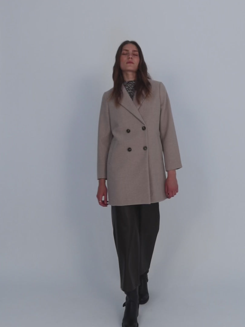 Classic camel cut coat with opening at the back