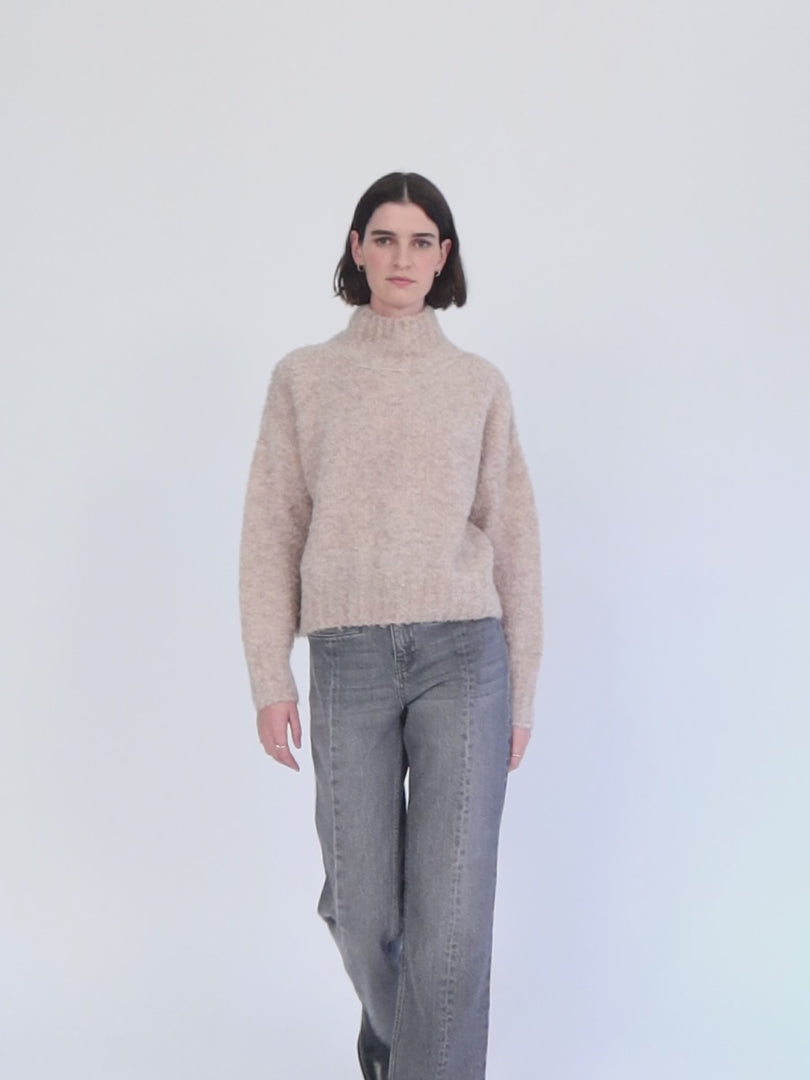 Oversize bouclé turtleneck sweater